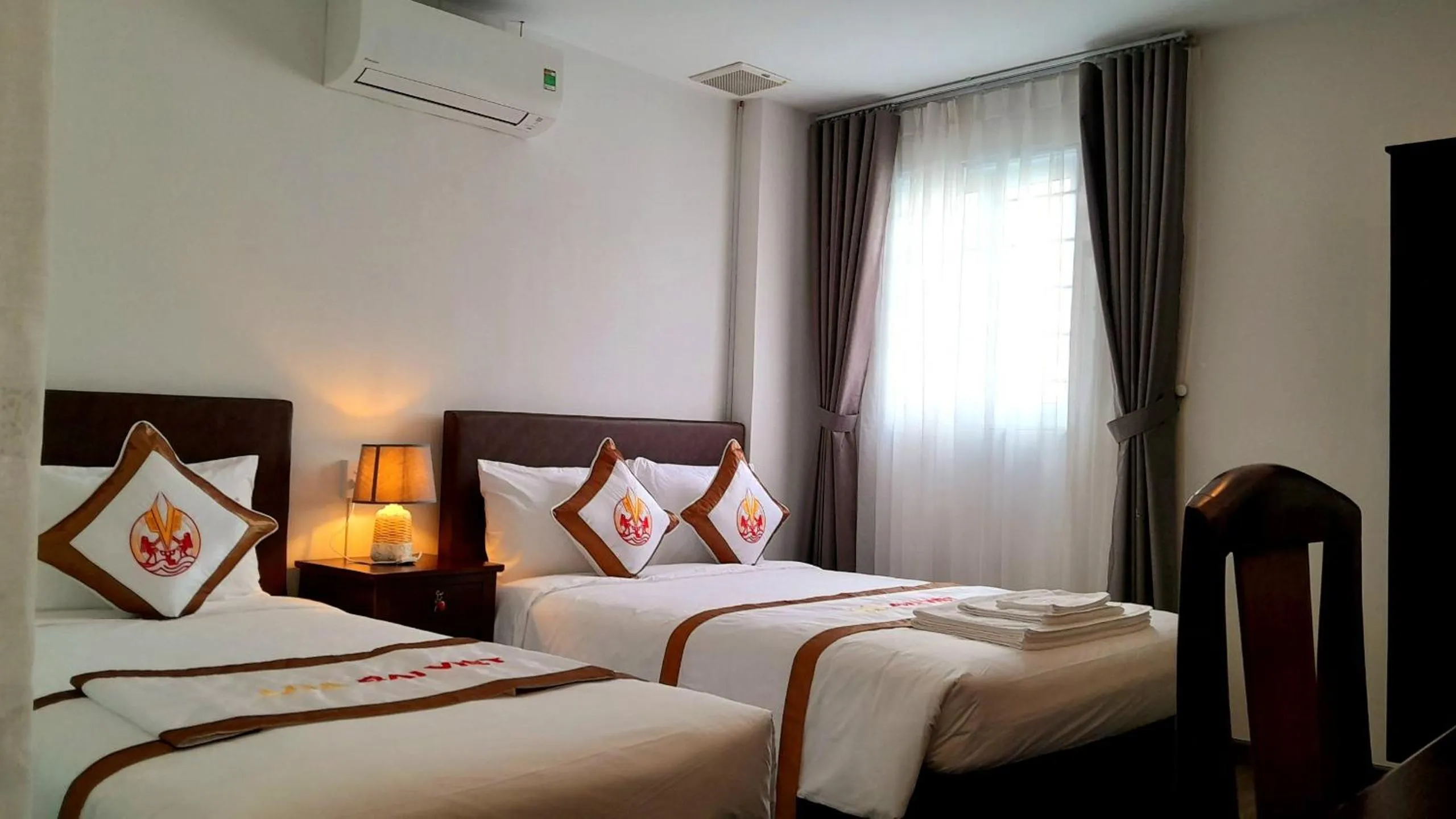 Bed in THE RICE HOTEL