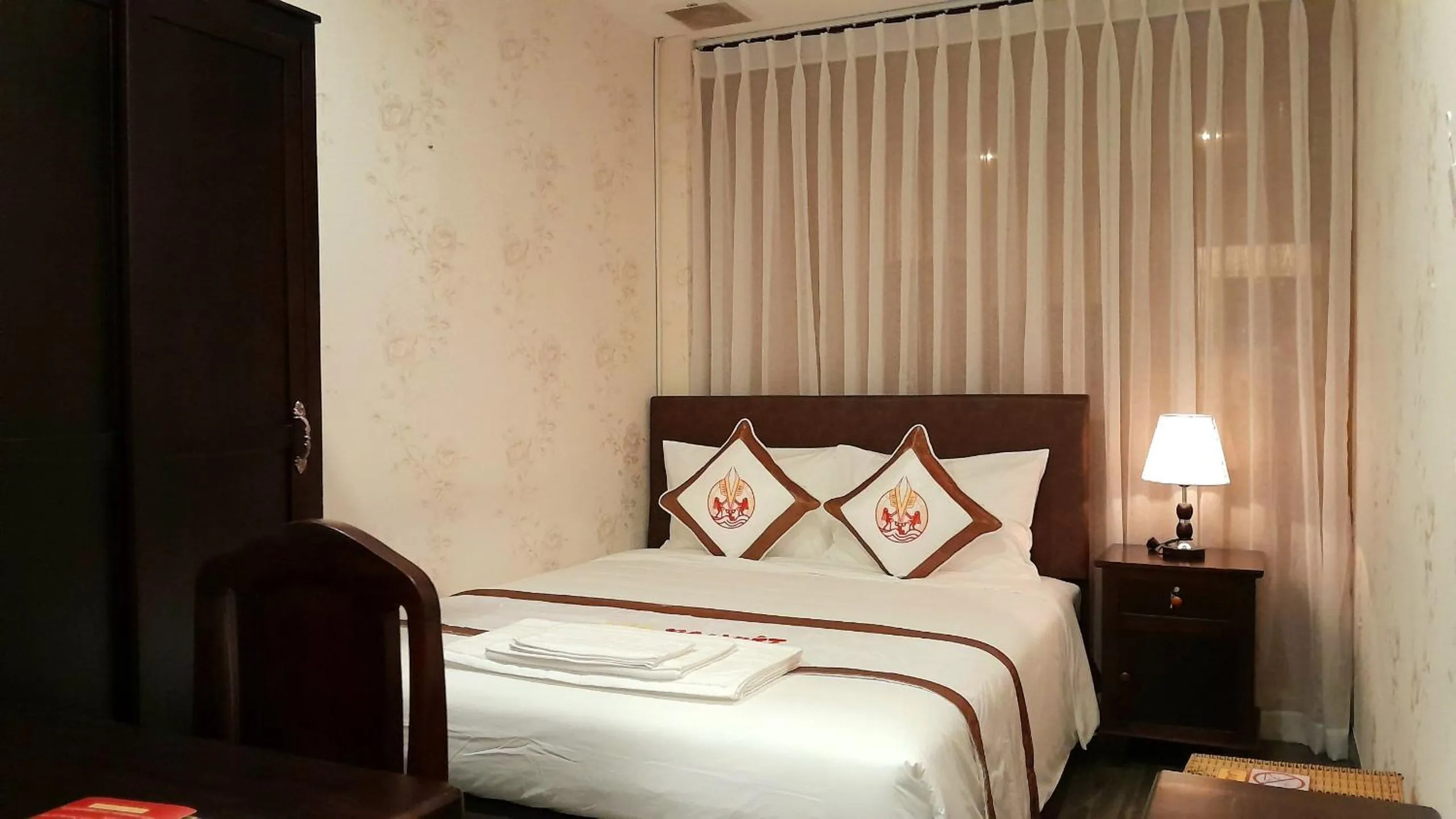 Bed in THE RICE HOTEL