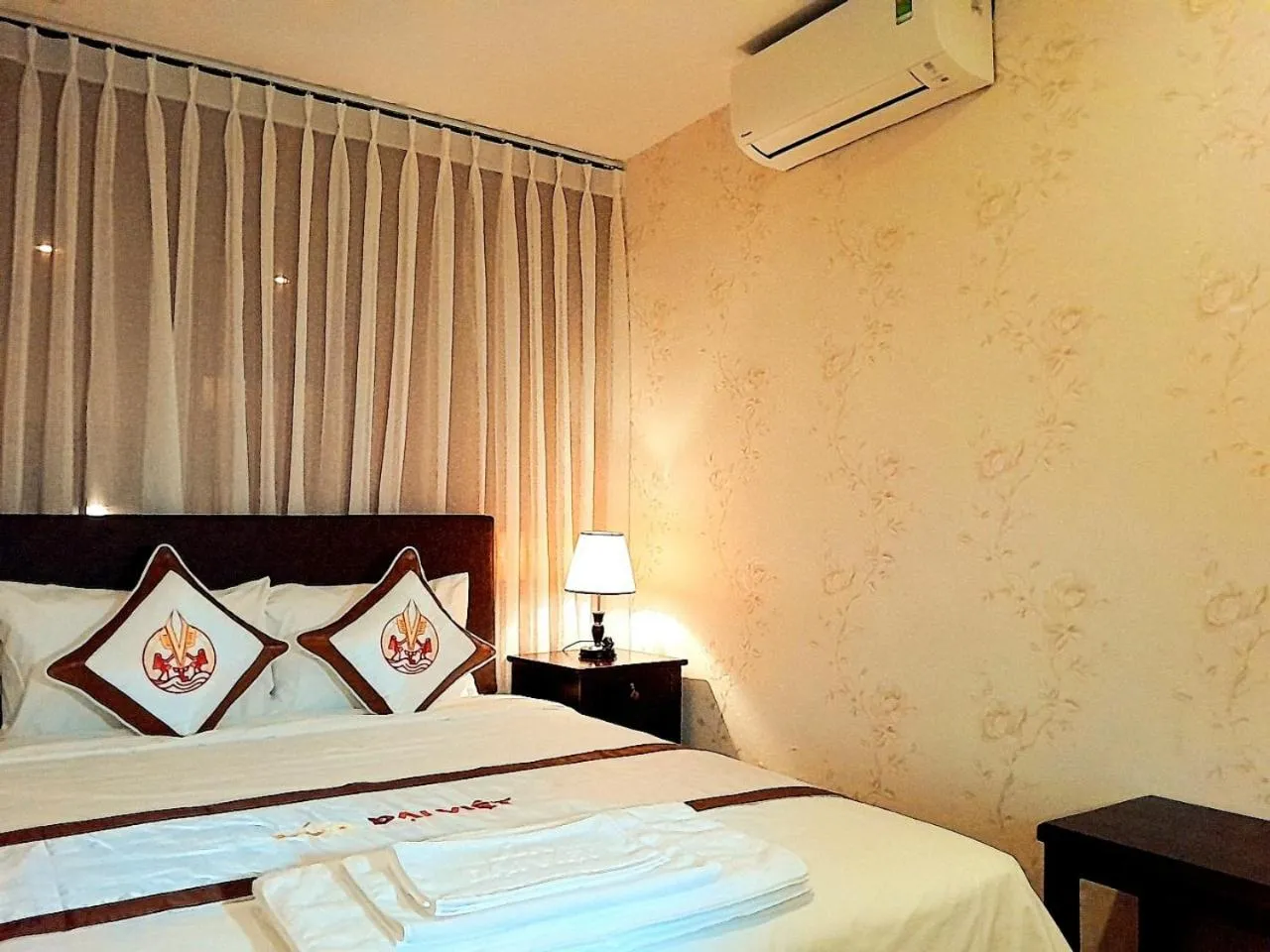 Bed in THE RICE HOTEL