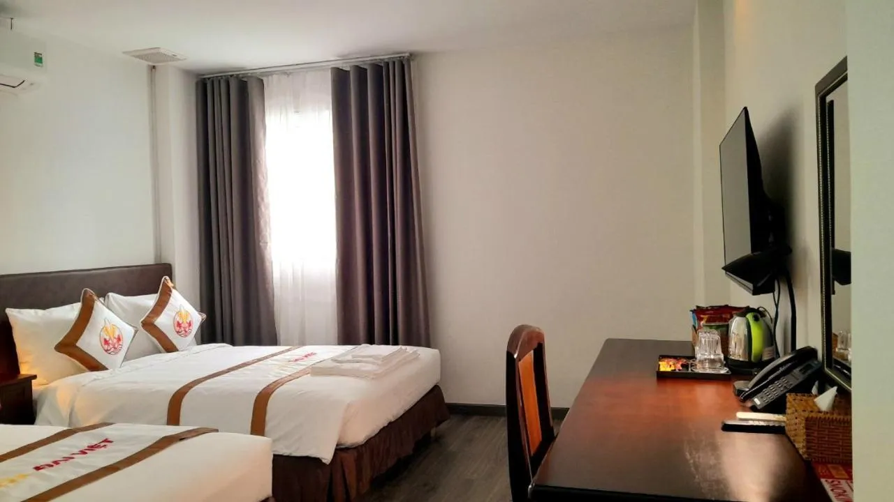 Bed in THE RICE HOTEL