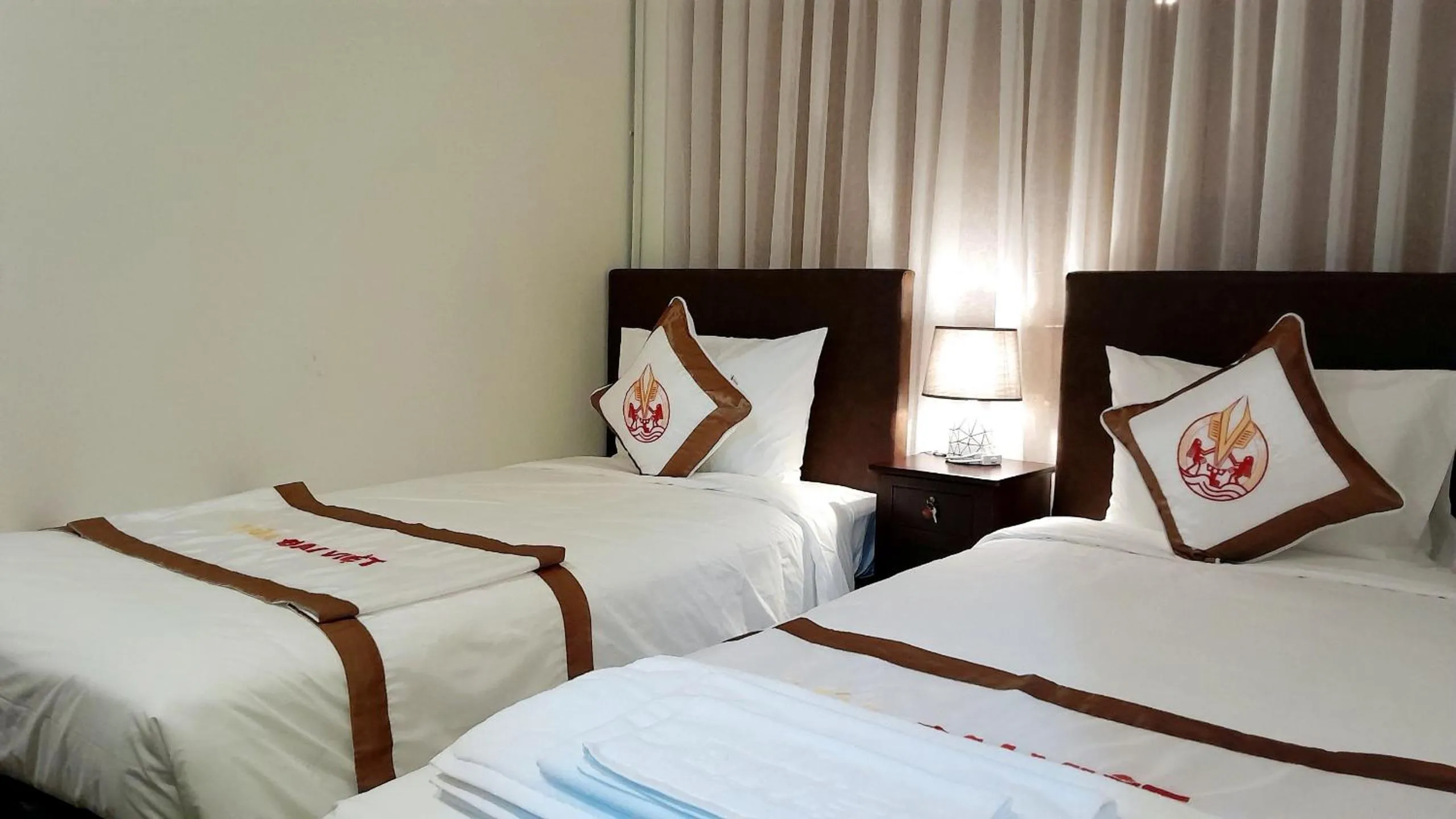 Bed in THE RICE HOTEL