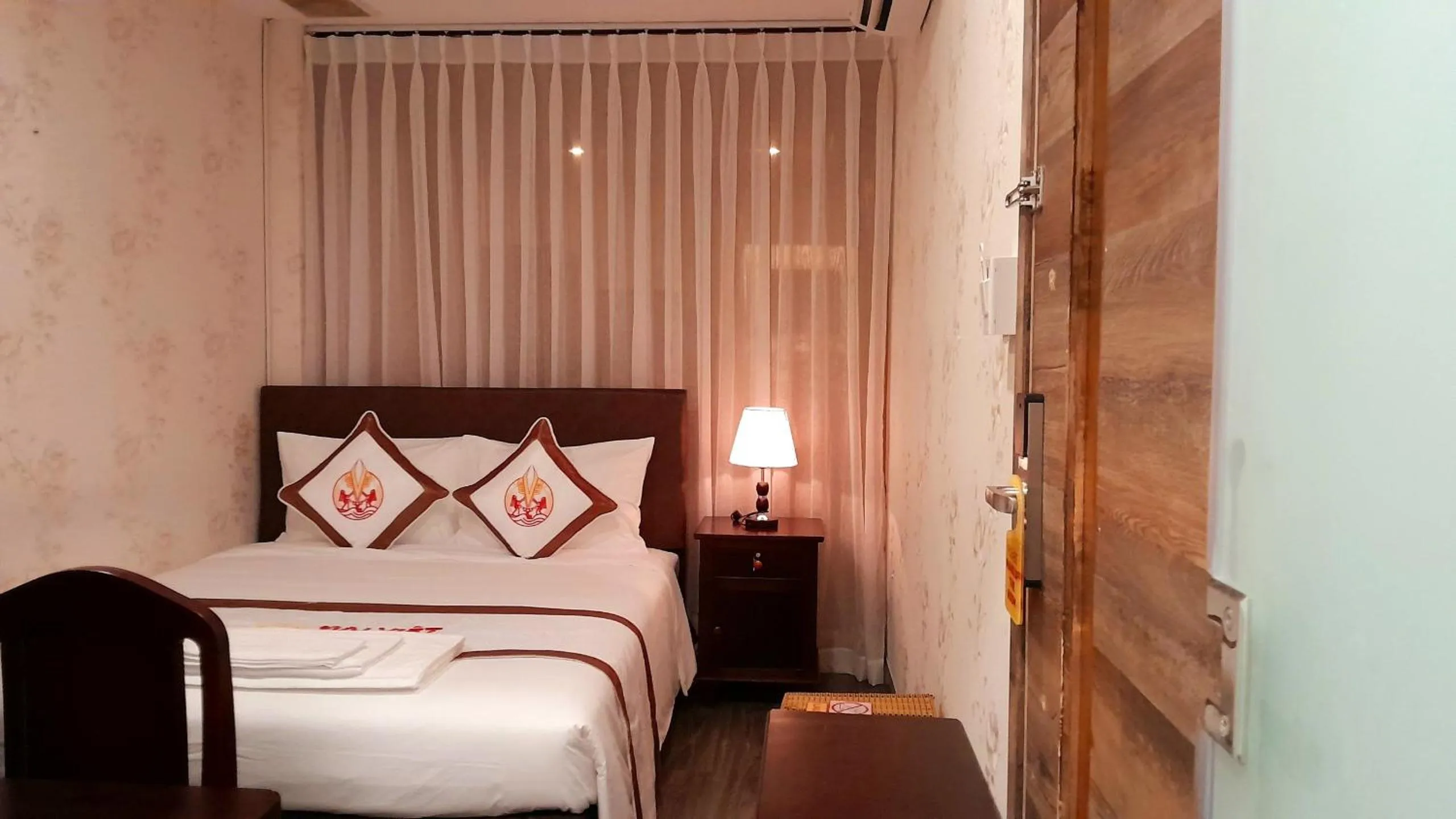 Bed in THE RICE HOTEL