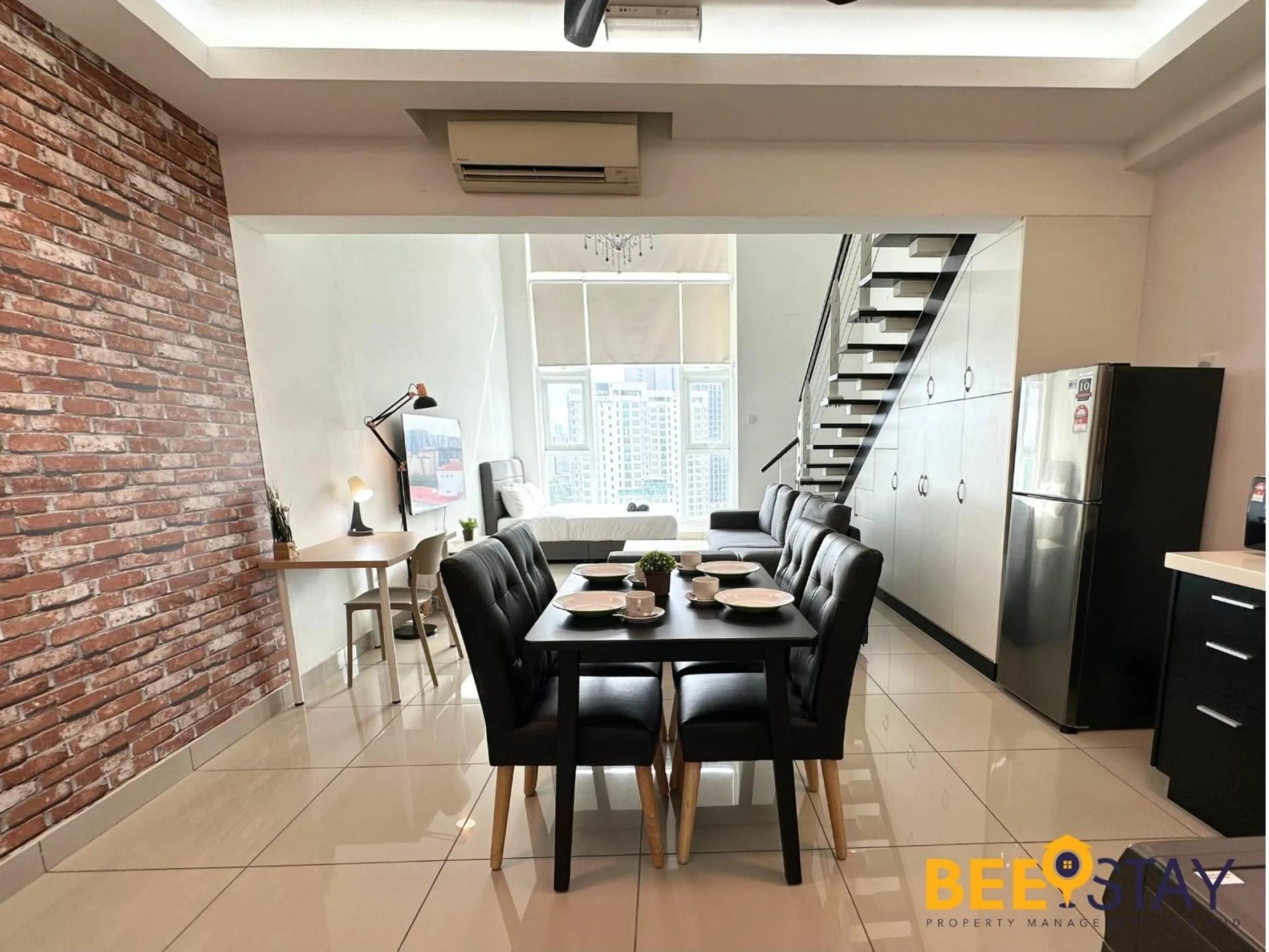 Living room in The Scott Garden Kuala Lumpur by BeeStay Management