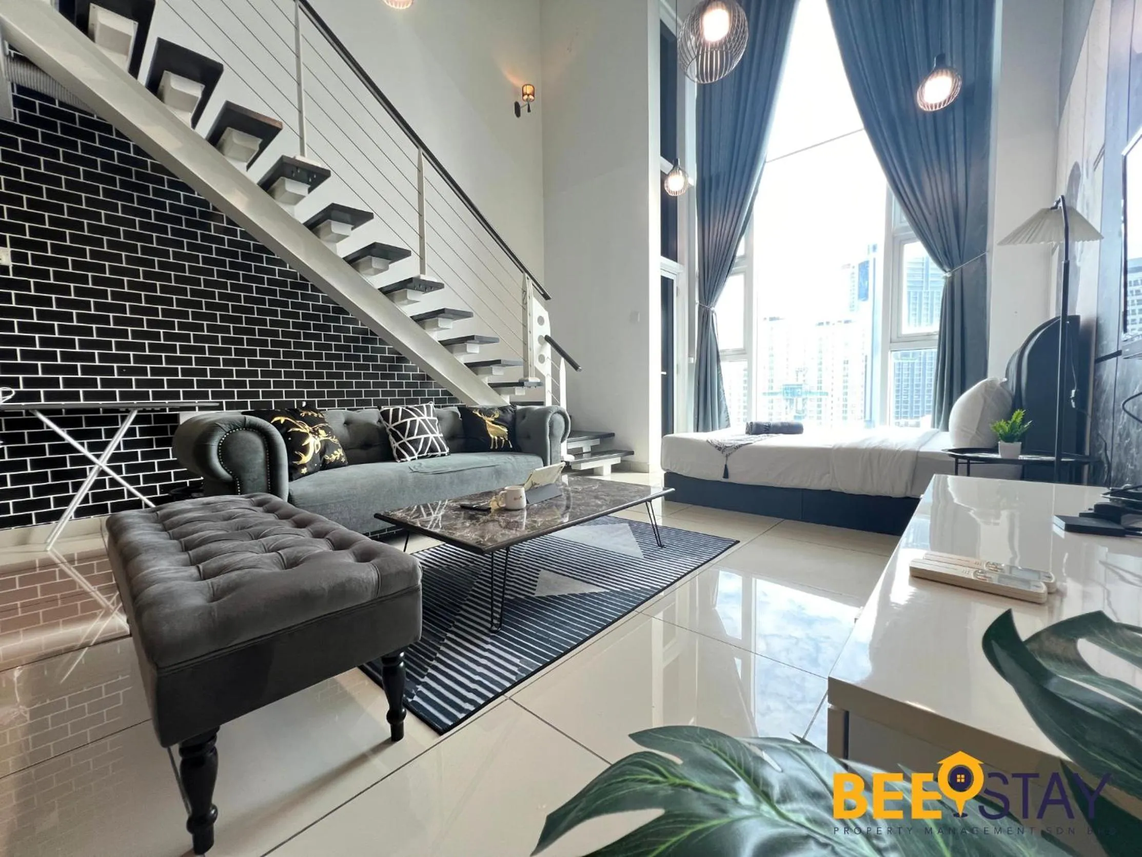 Living room in The Scott Garden Kuala Lumpur by BeeStay Management
