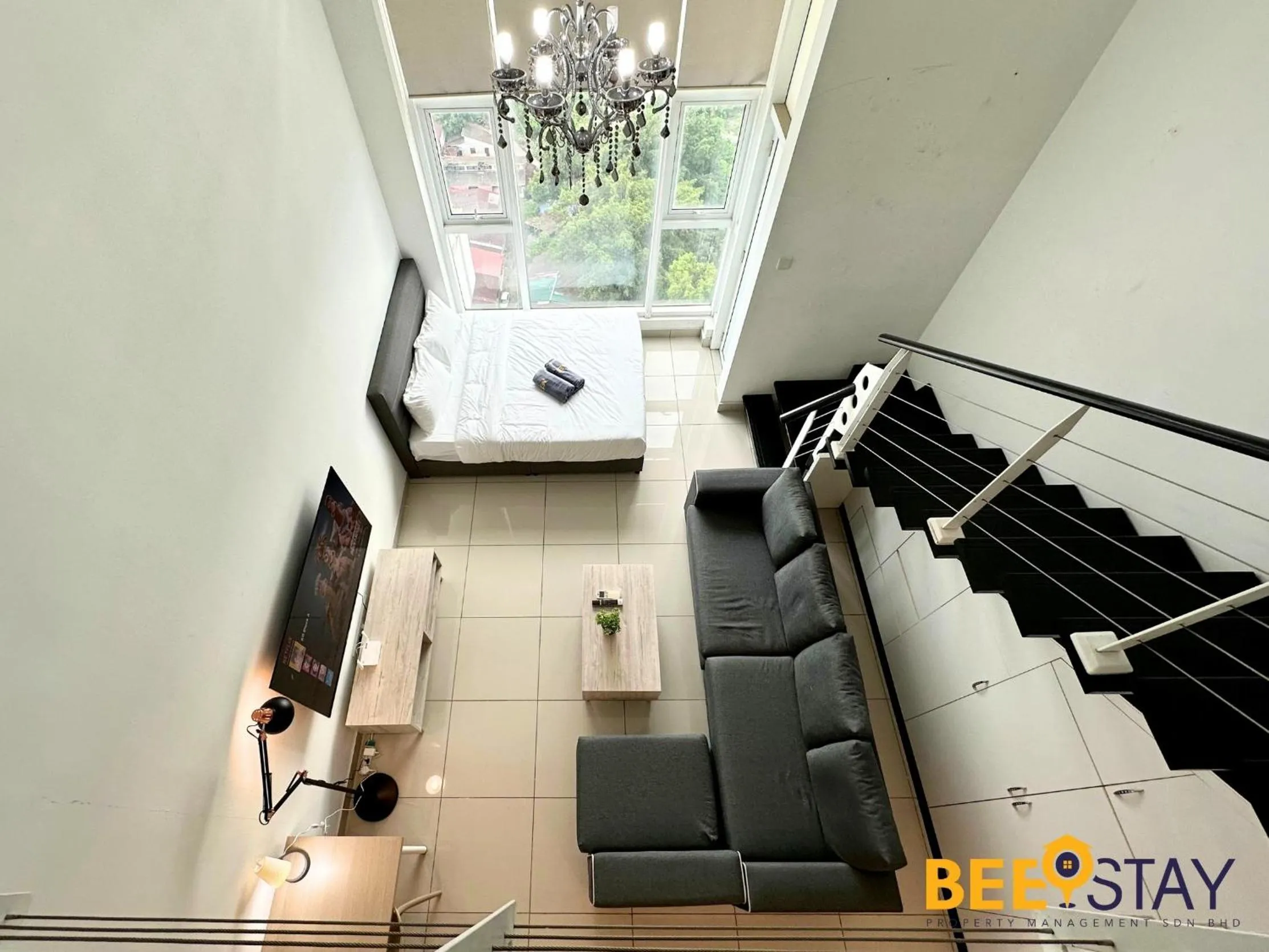 Living room in The Scott Garden Kuala Lumpur by BeeStay Management
