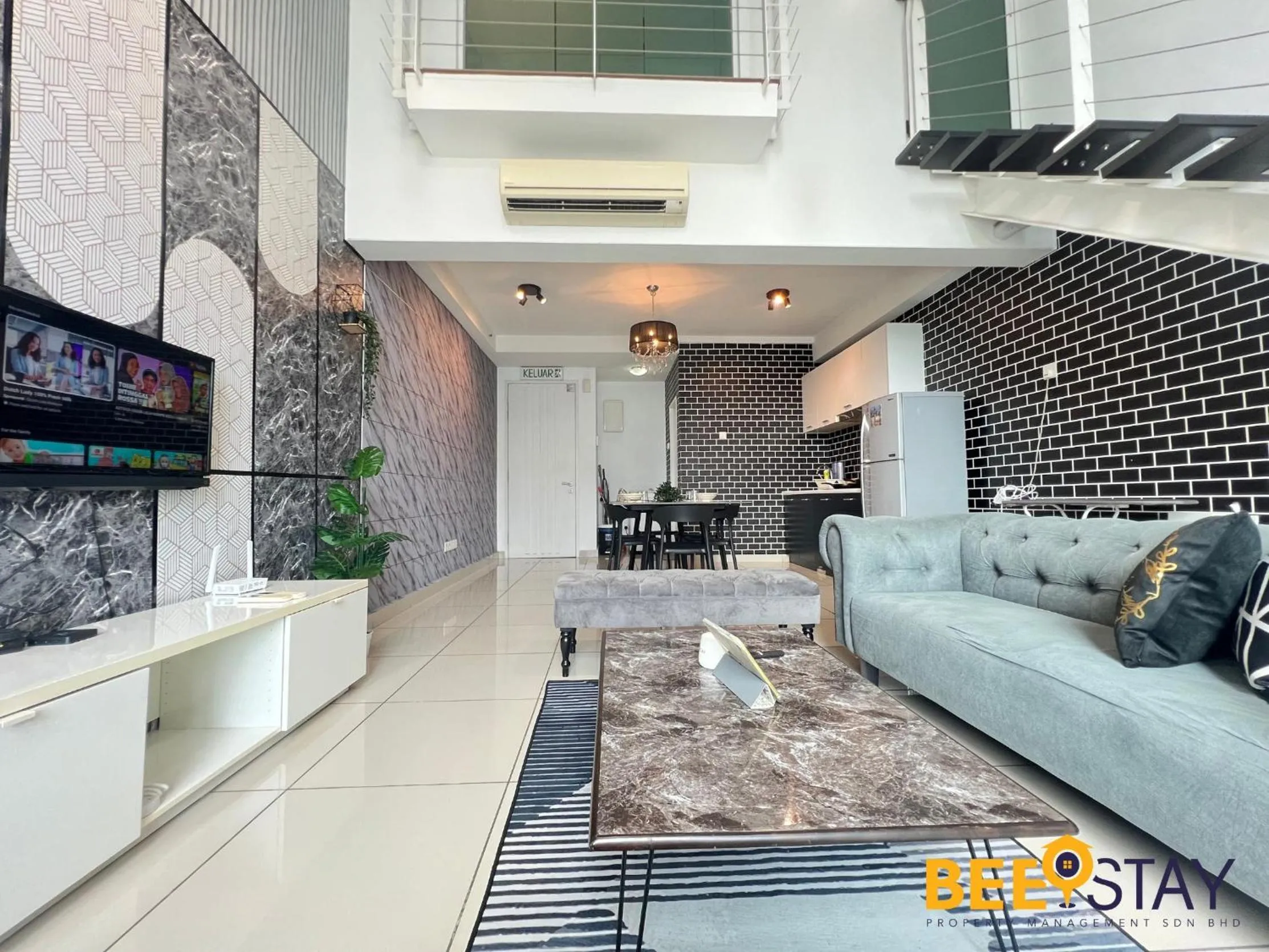 Living room in The Scott Garden Kuala Lumpur by BeeStay Management