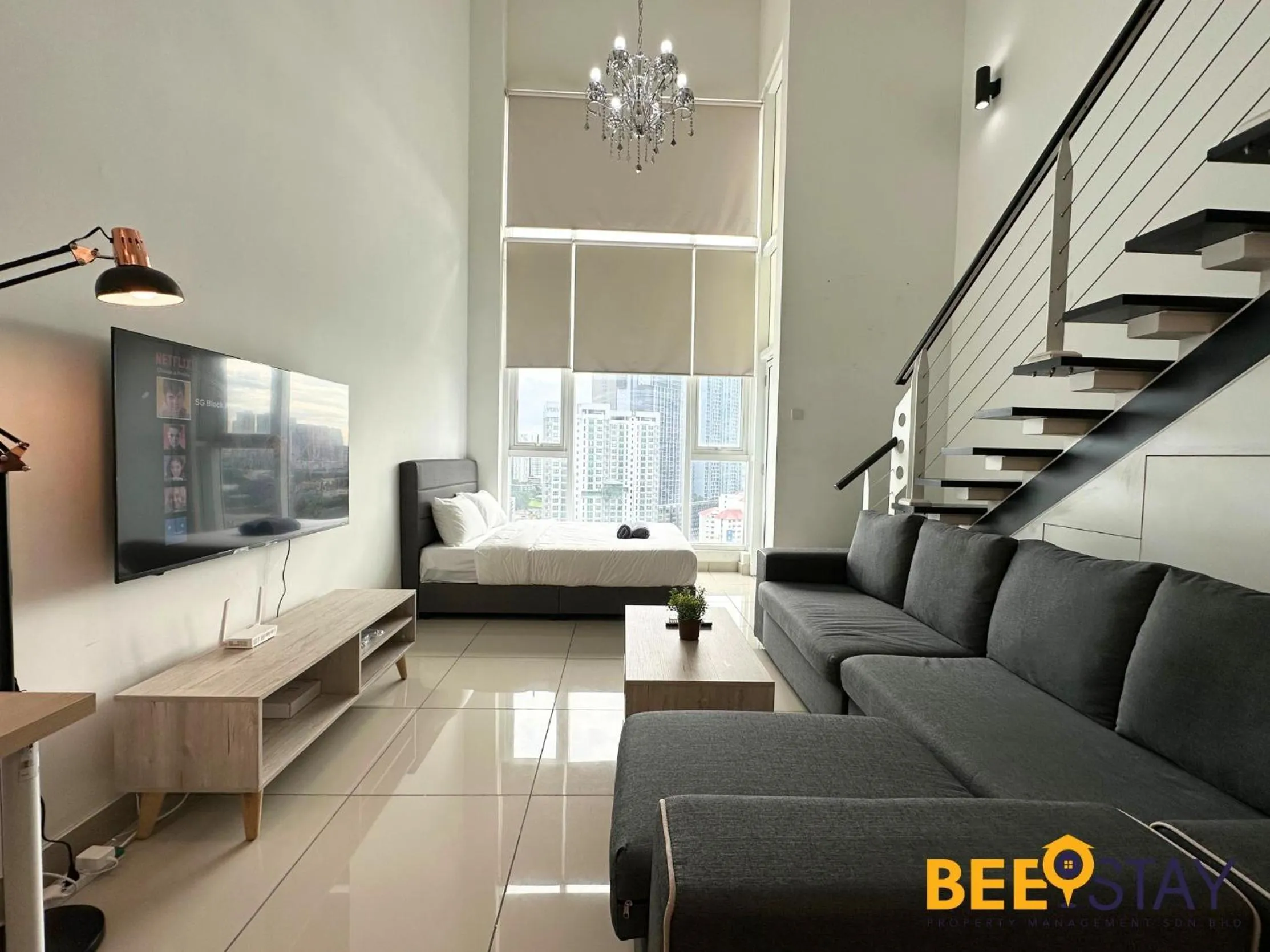 Living room in The Scott Garden Kuala Lumpur by BeeStay Management