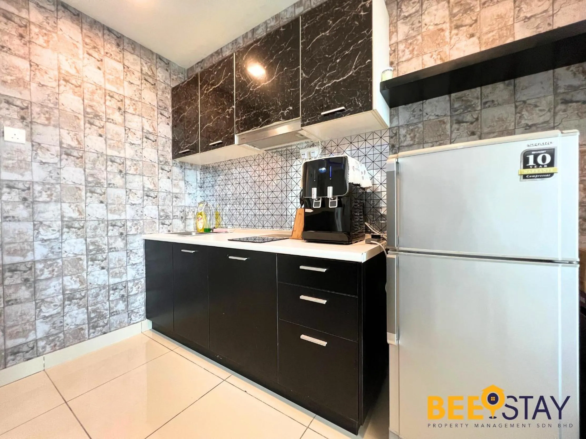 Kitchen or kitchenette in The Scott Garden Kuala Lumpur by BeeStay Management