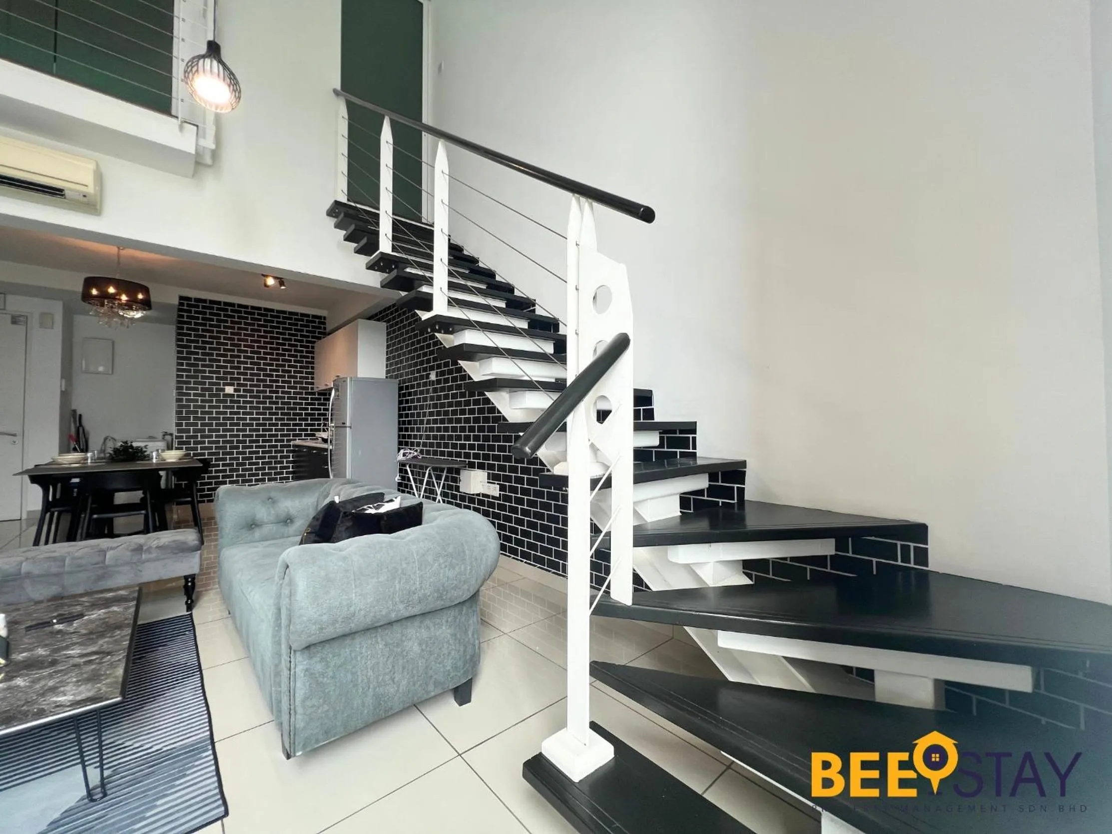 Living room in The Scott Garden Kuala Lumpur by BeeStay Management