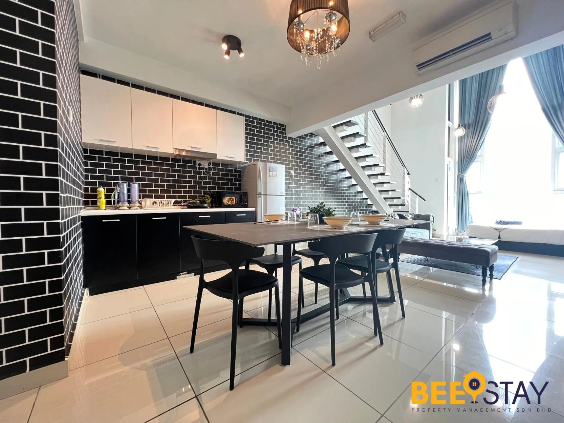 Dining area in The Scott Garden Kuala Lumpur by BeeStay Management