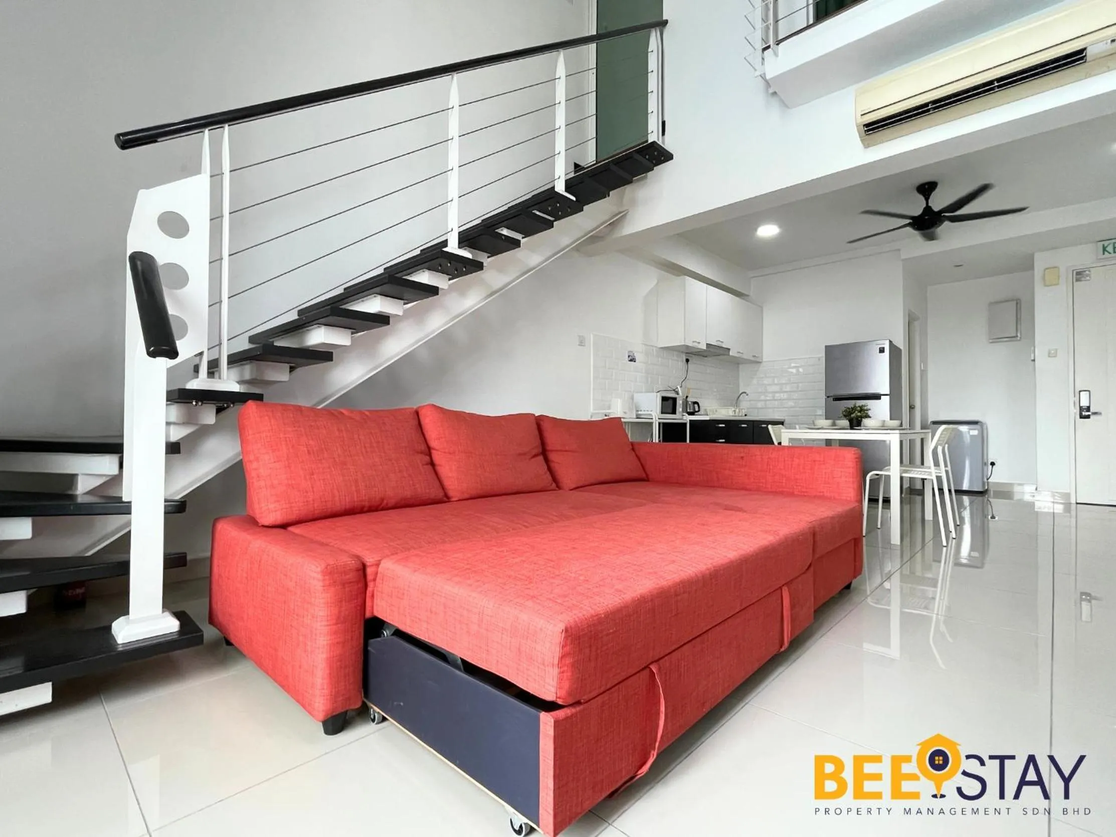Living room in The Scott Garden Kuala Lumpur by BeeStay Management