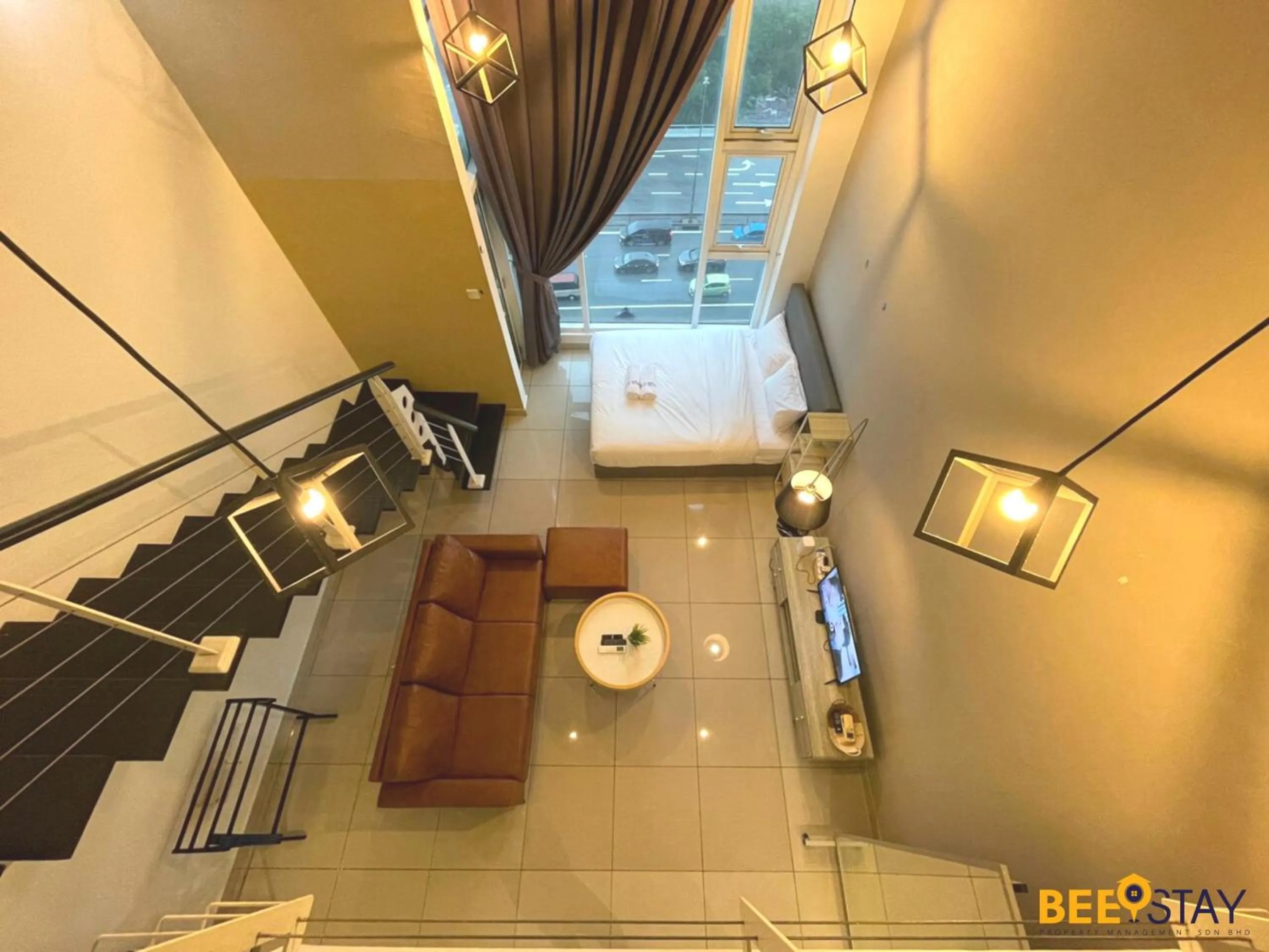 Living room in The Scott Garden Kuala Lumpur by BeeStay Management