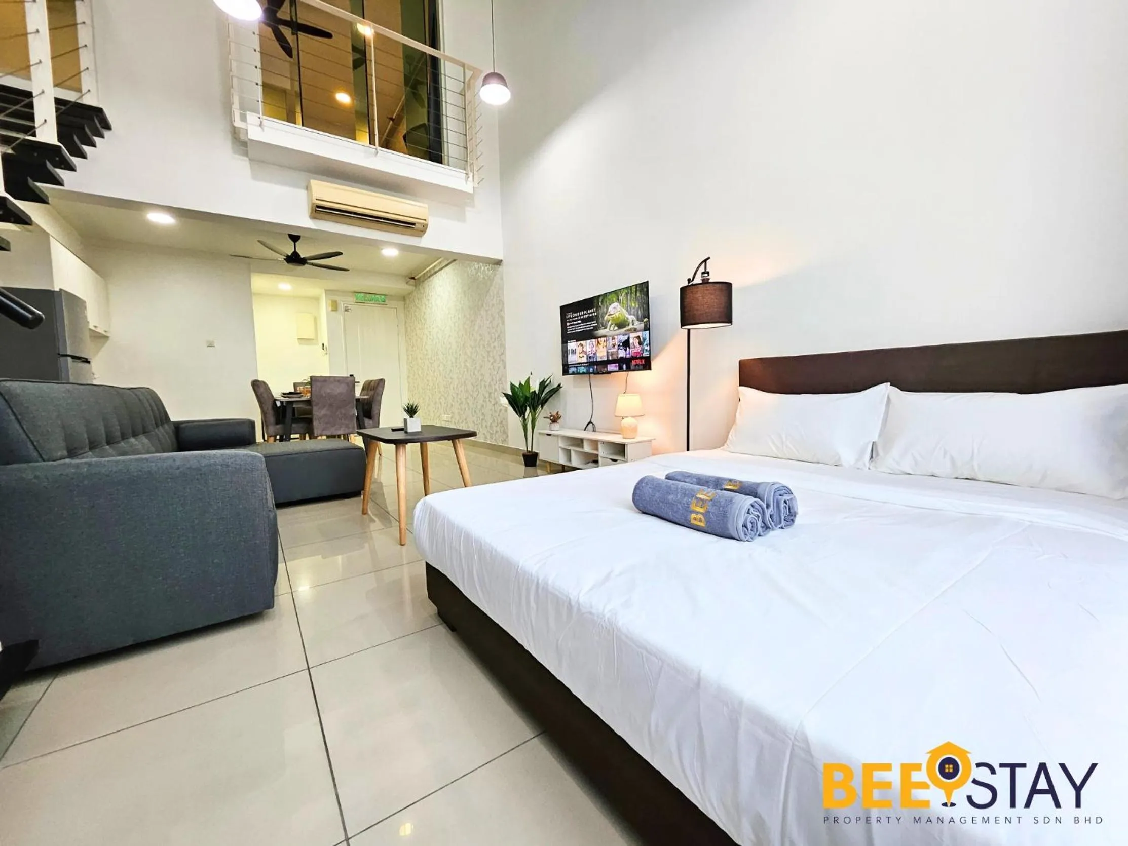 Living room, Bed in The Scott Garden Kuala Lumpur by BeeStay Management