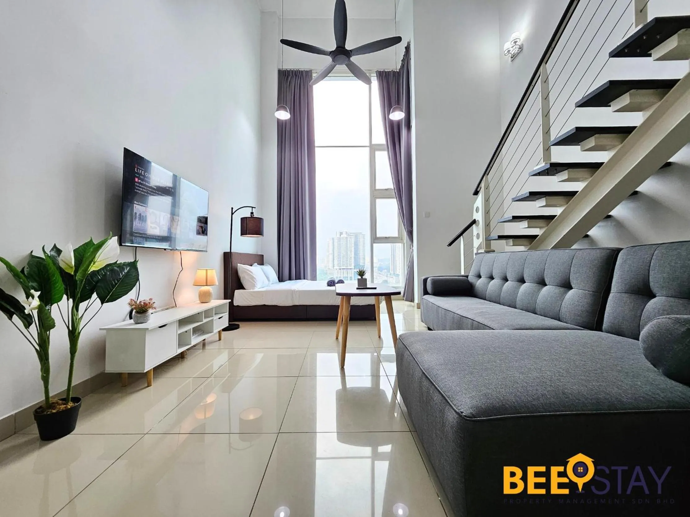 Living room in The Scott Garden Kuala Lumpur by BeeStay Management