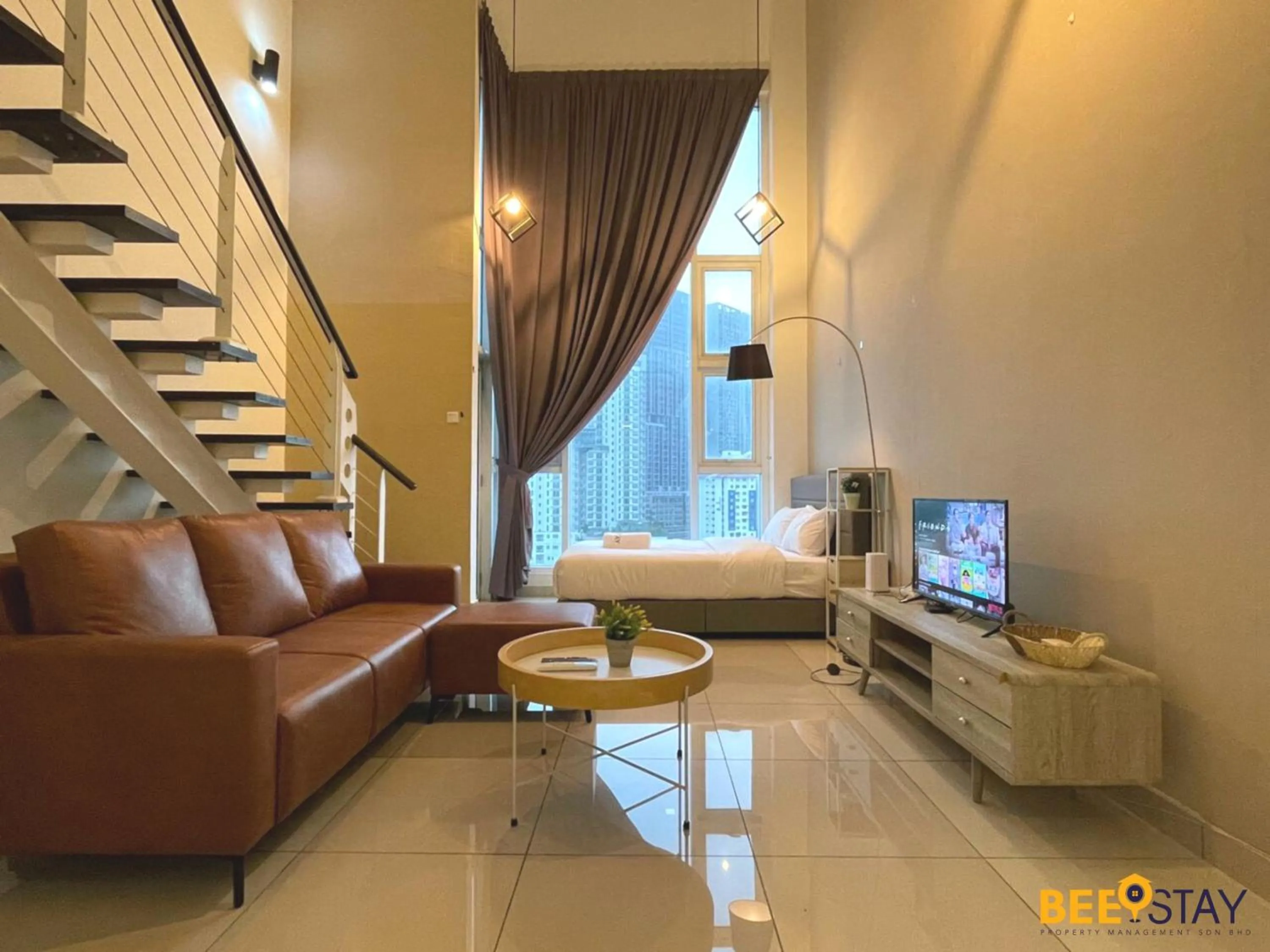 Living room in The Scott Garden Kuala Lumpur by BeeStay Management