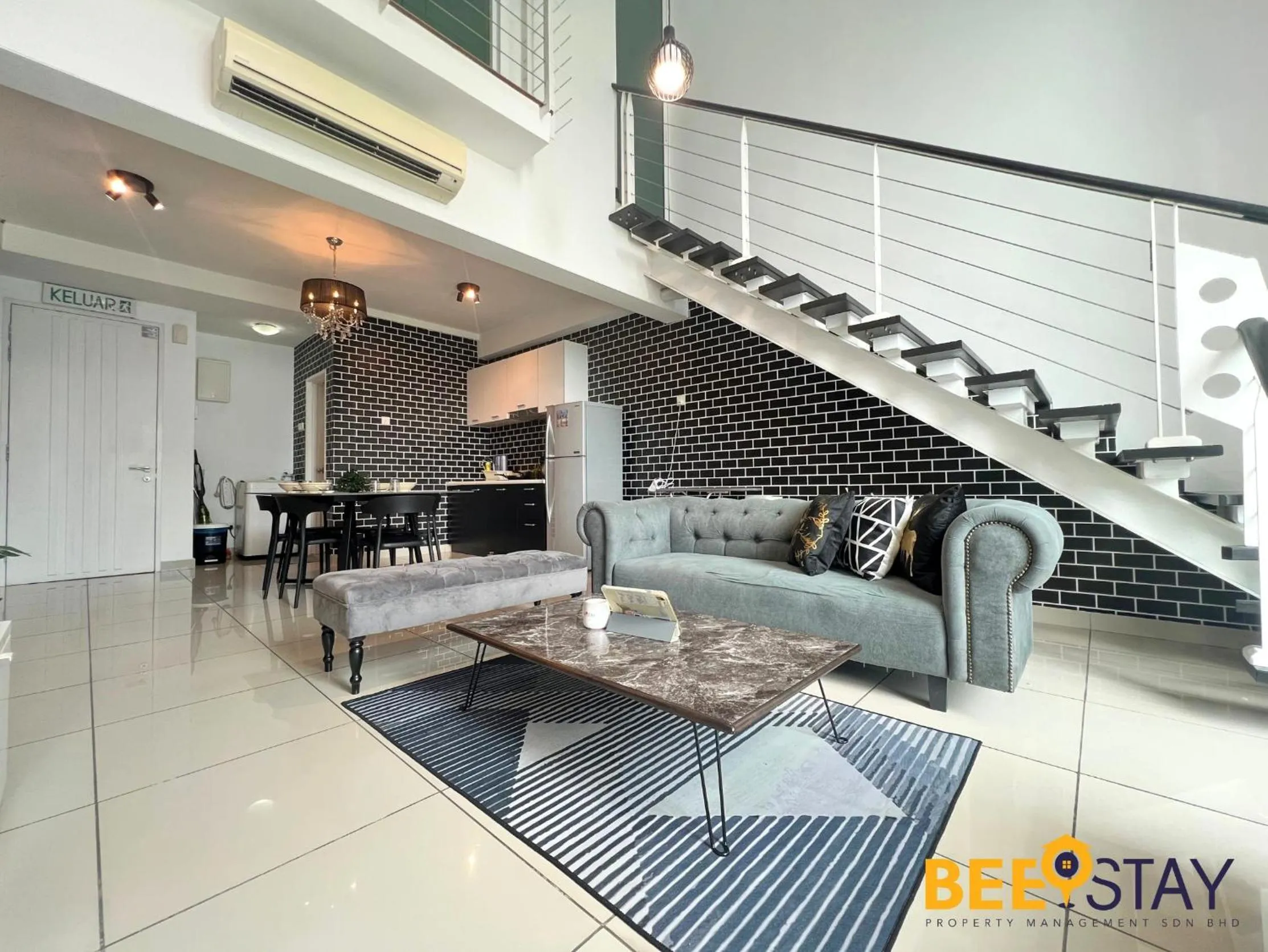 Living room in The Scott Garden Kuala Lumpur by BeeStay Management