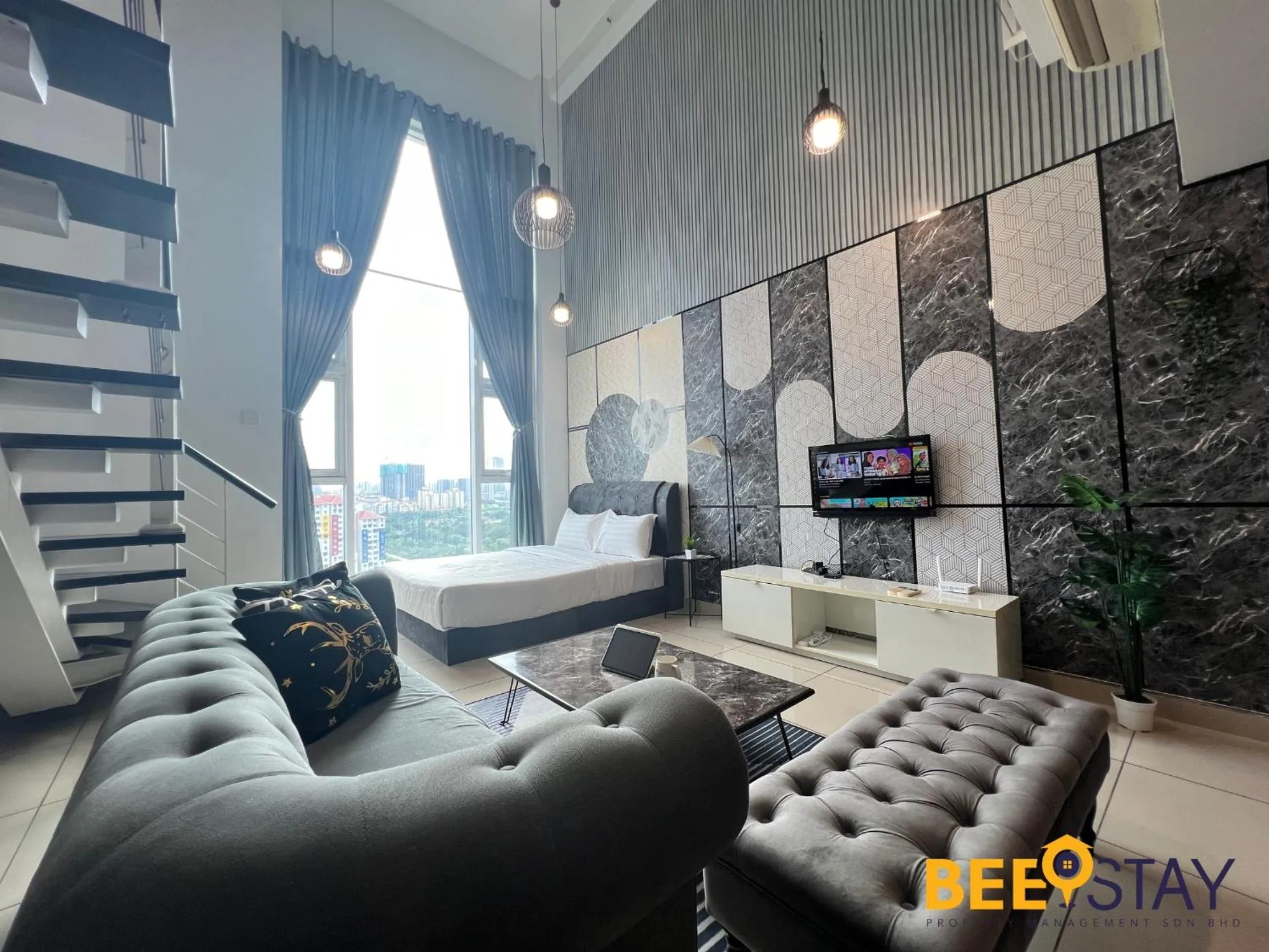 Living room in The Scott Garden Kuala Lumpur by BeeStay Management