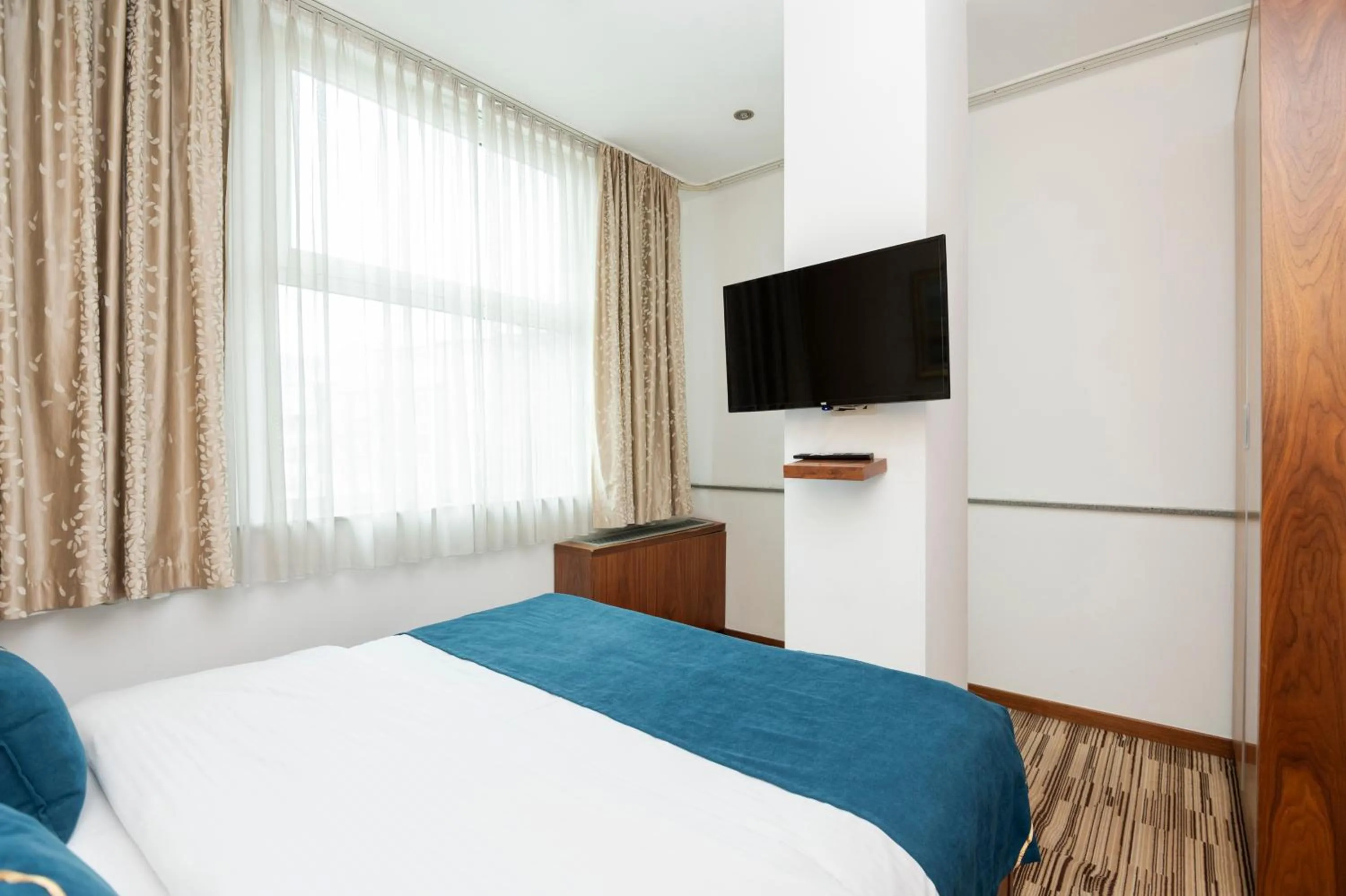 Bed in Hotel Bistrik City Center