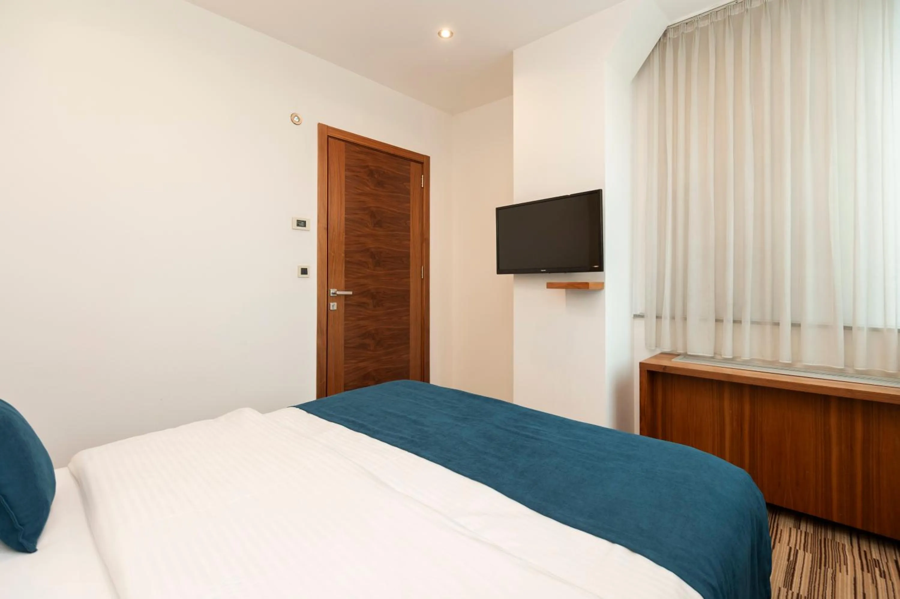 Bed in Hotel Bistrik City Center