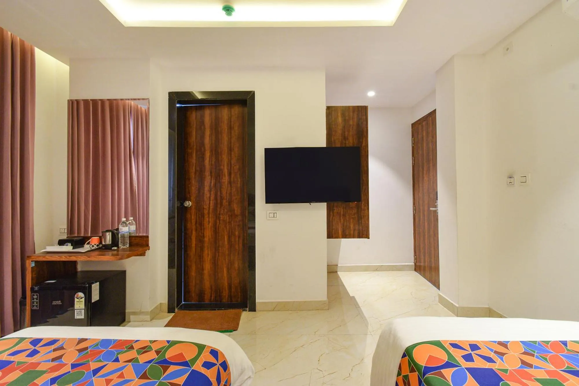 Bed in FabHotel Prime Prowell Apex