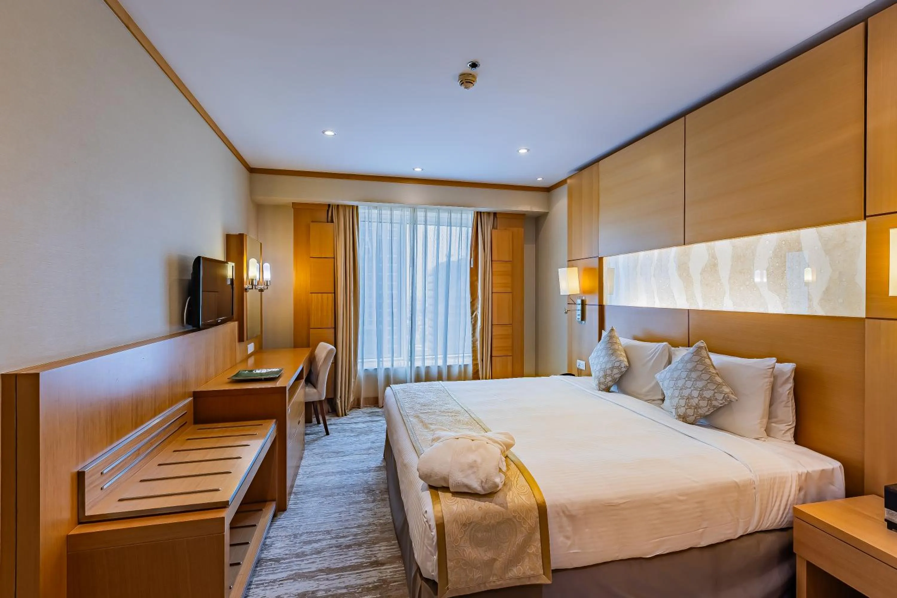 Bed in Carlton Downtown Hotel