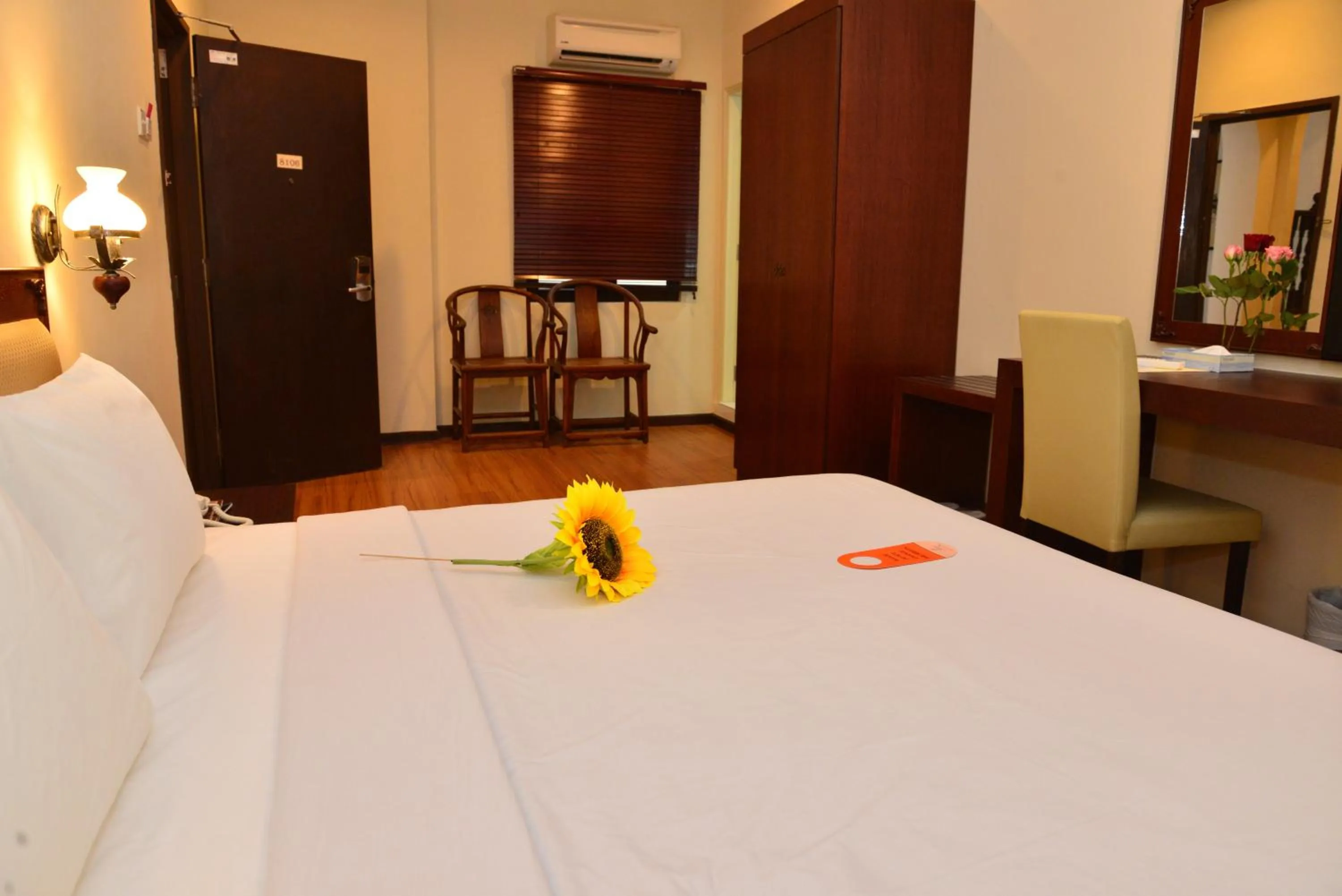 Bed in Cheng Ho Hotel