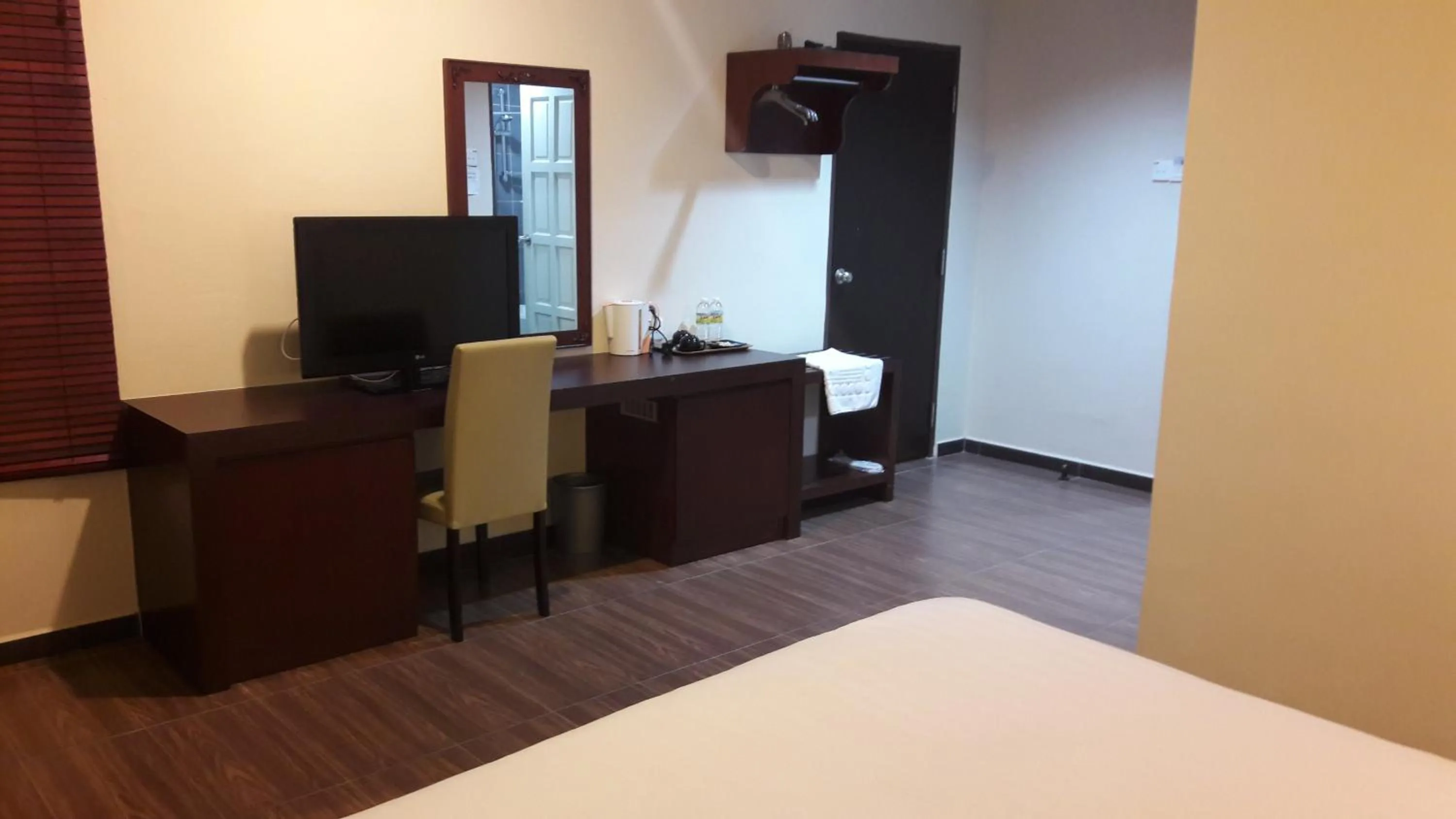 Bed in Cheng Ho Hotel