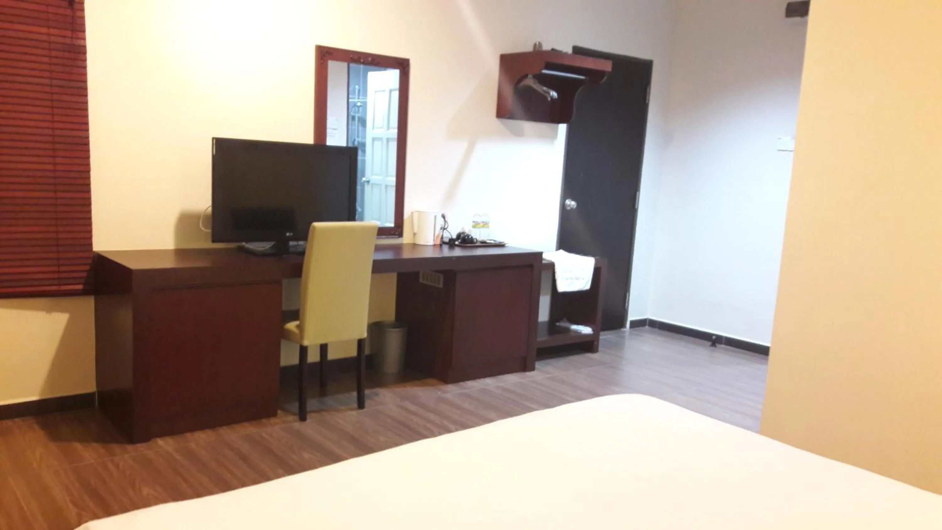 Bed in Cheng Ho Hotel