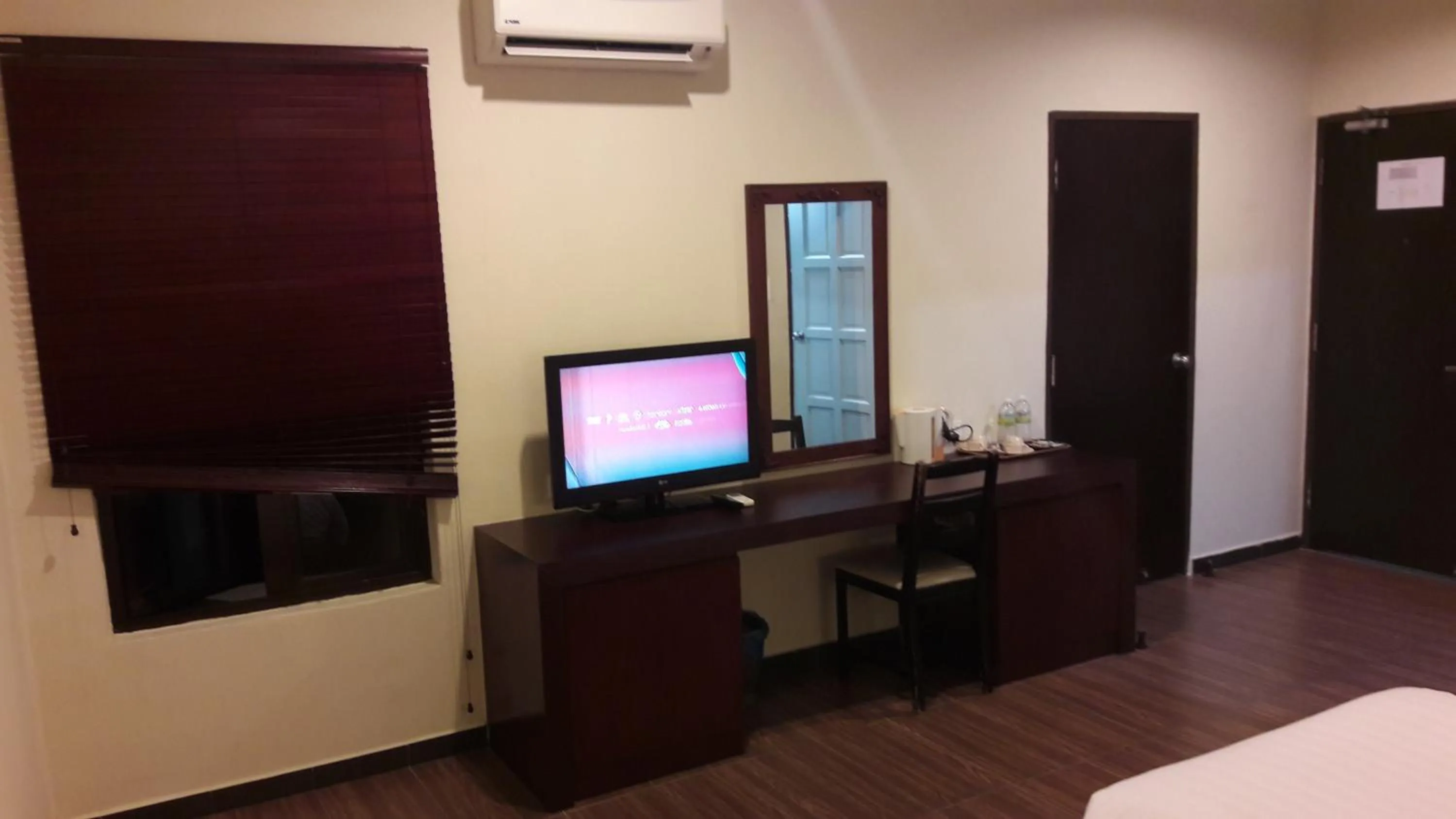 Bed in Cheng Ho Hotel