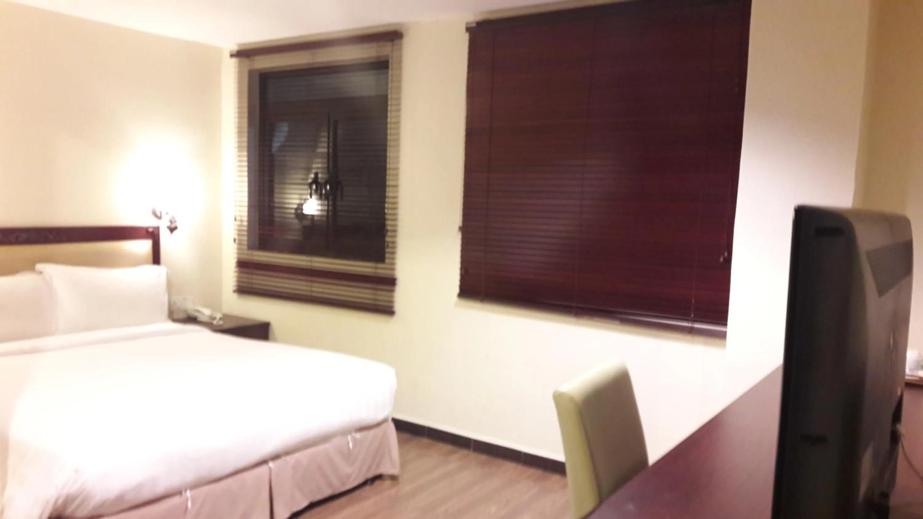 Bed in Cheng Ho Hotel