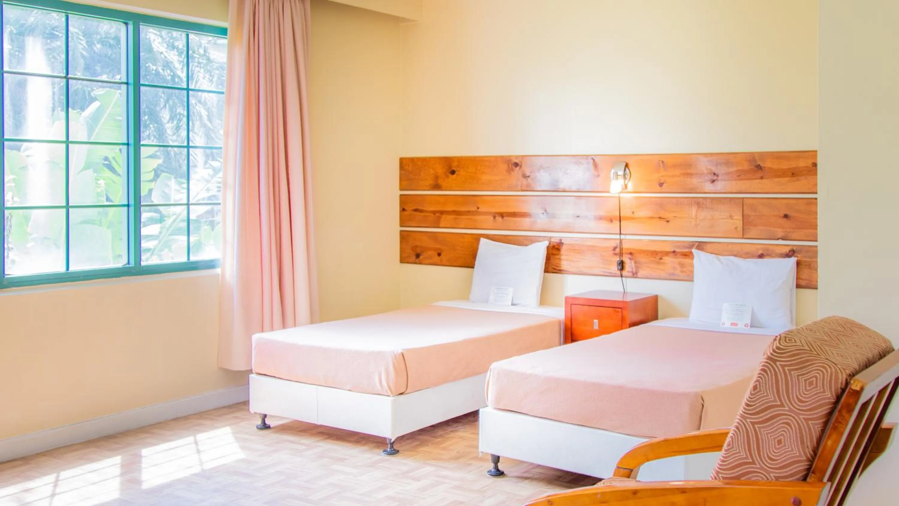 Bed in Garden Villa Hotel