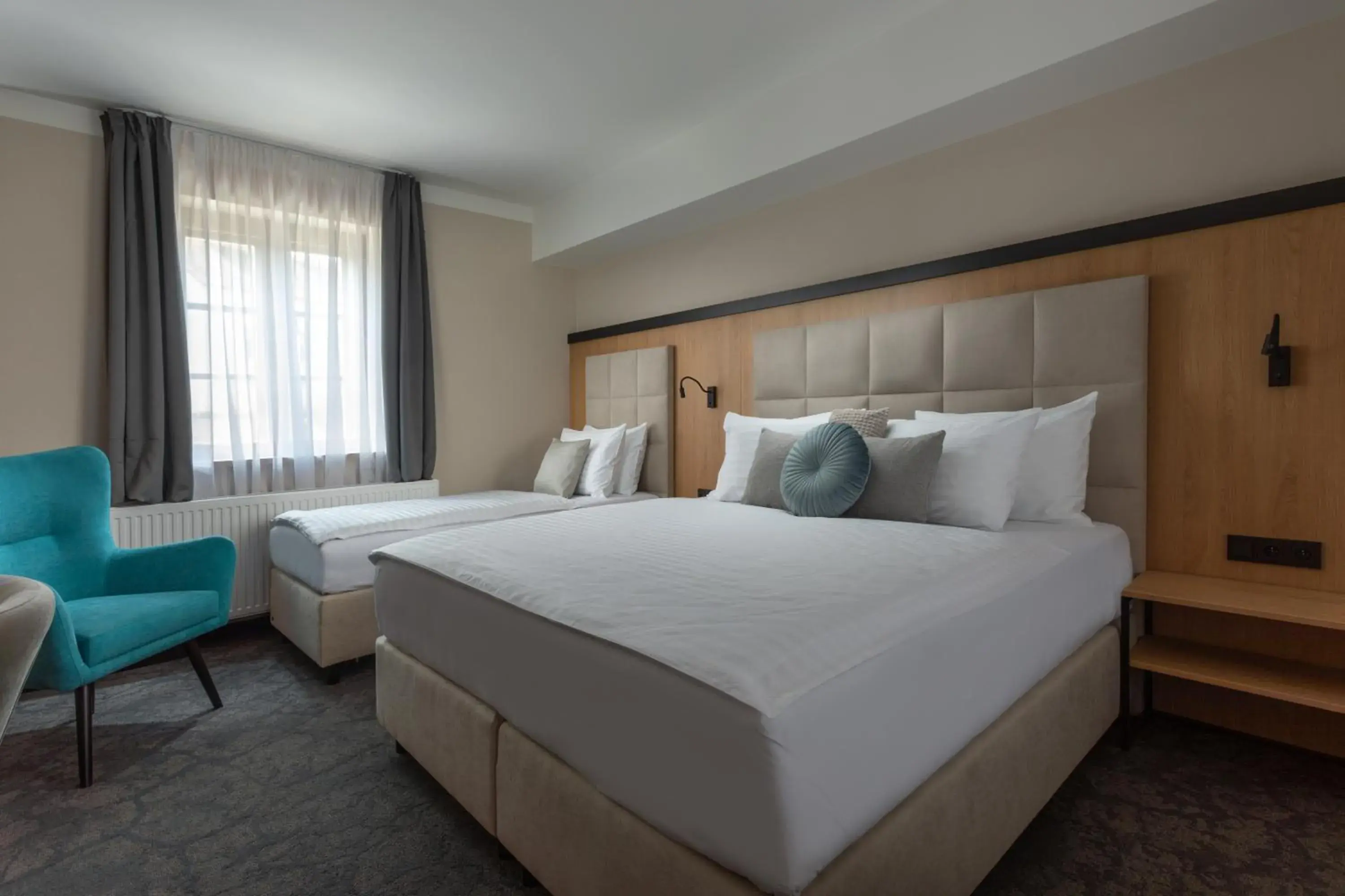 Deluxe Triple Room in Pivovar Rožmberk Deluxe Triple Room in Pivovar Rožmberk