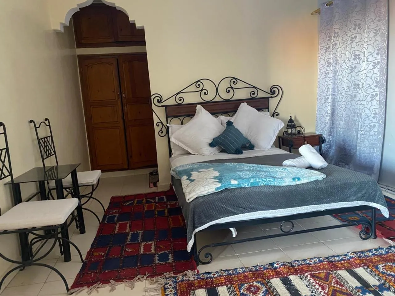 Bed in APPART AIGLE HOTEL