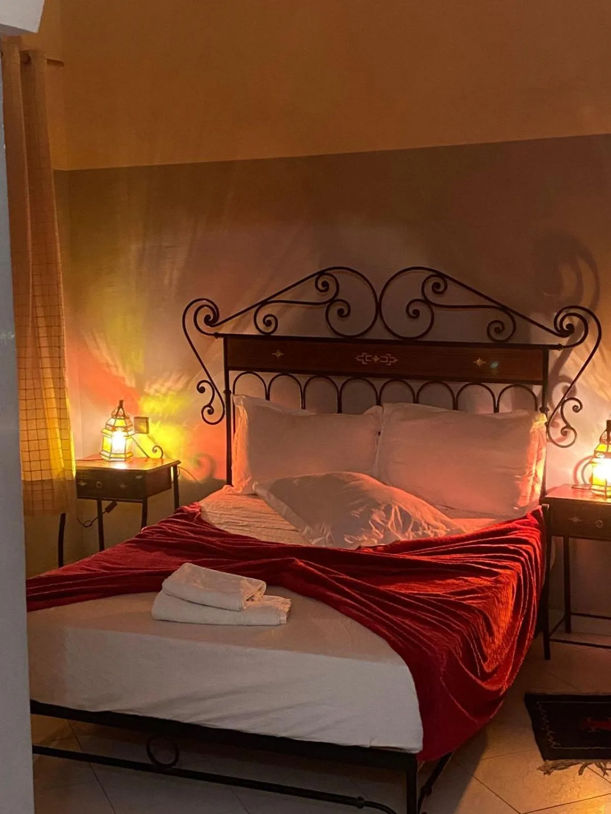 Bed in APPART AIGLE HOTEL