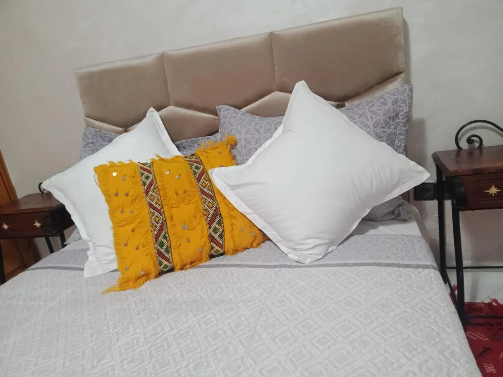 Bed in APPART AIGLE HOTEL