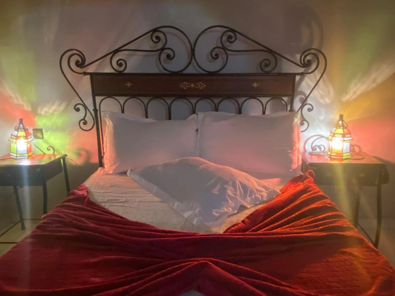 Bed in APPART AIGLE HOTEL