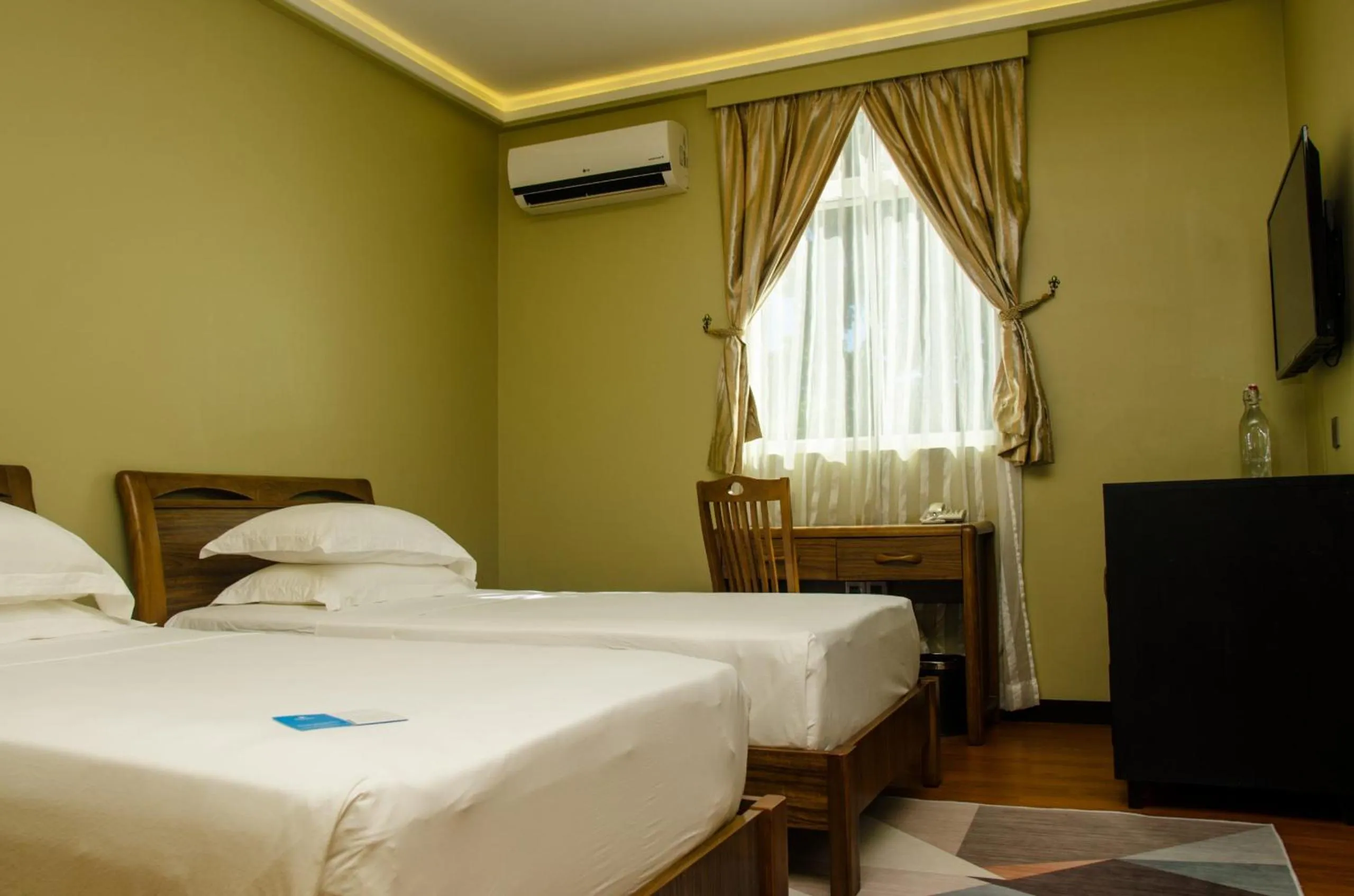 Bed in Fuvahmulah Central Hotel