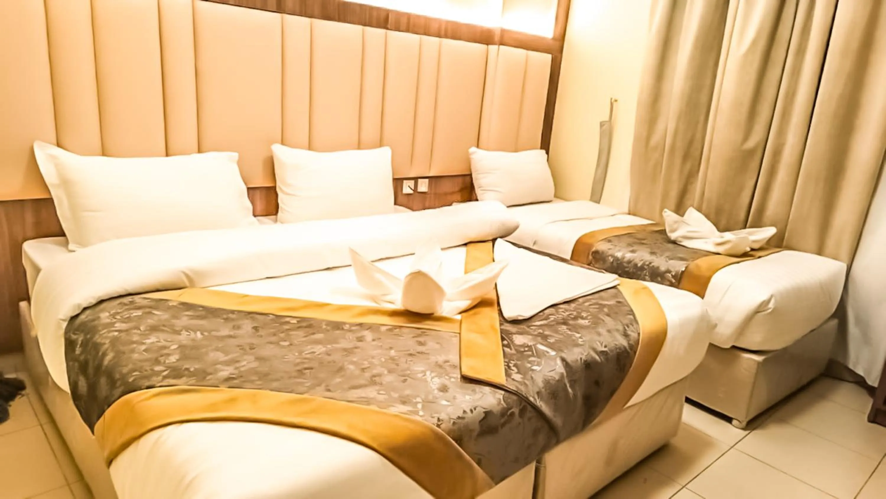 Bed in Diyafa Al Mukhtara Hotel فندق شركة ضيافة المختارة للخدمات الفندقية