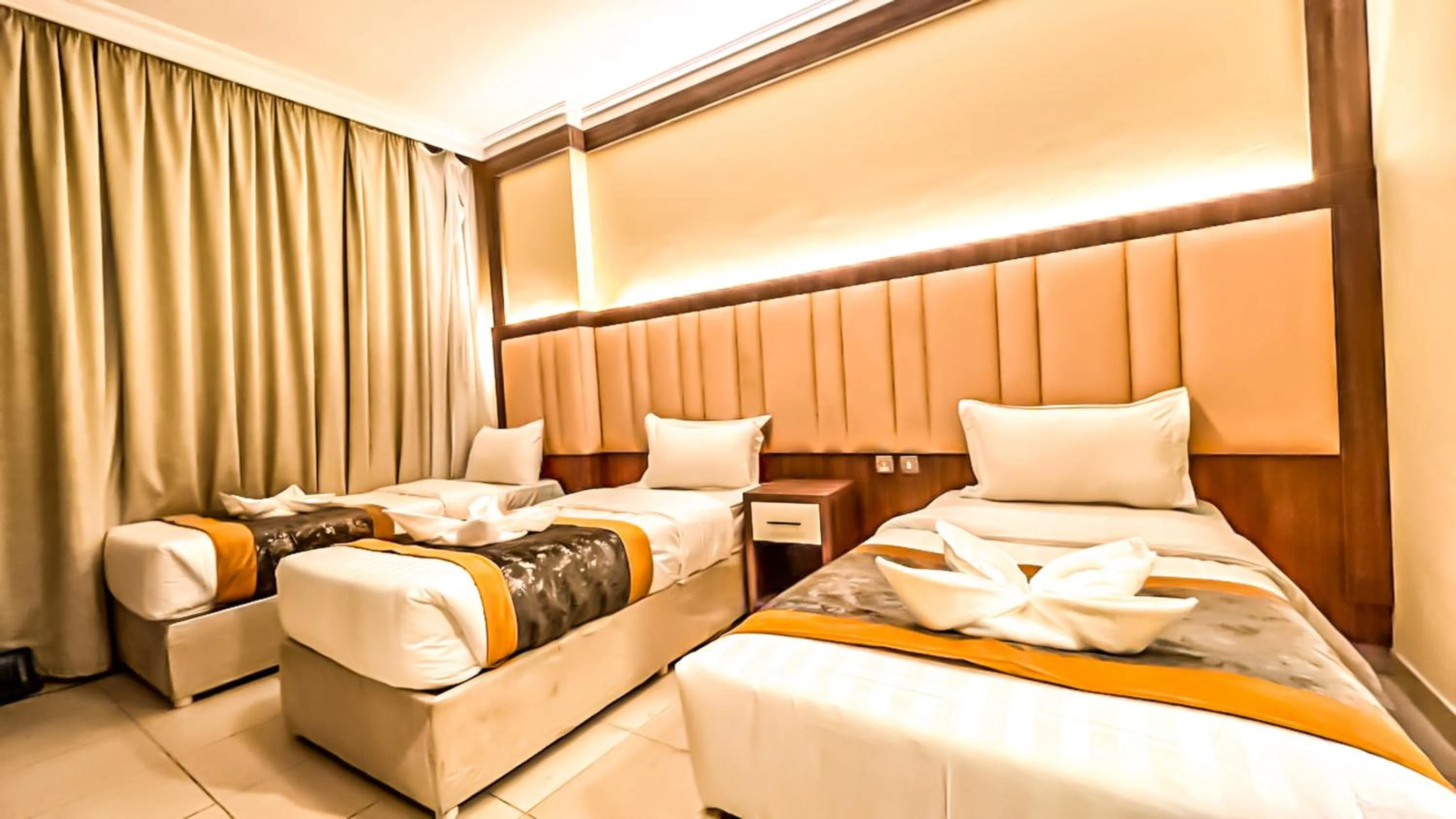 Bed in Diyafa Al Mukhtara Hotel فندق شركة ضيافة المختارة للخدمات الفندقية