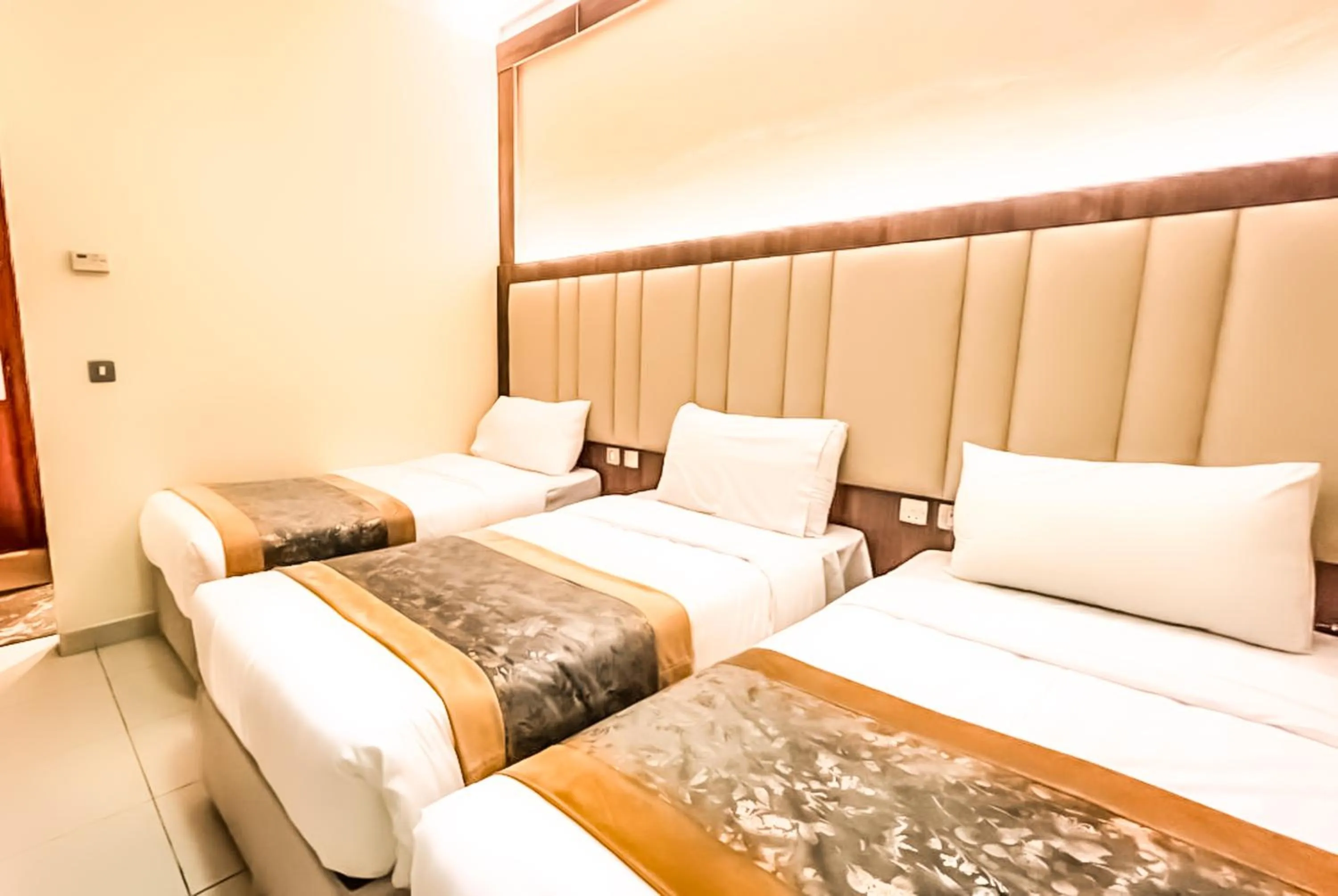 Bed in Diyafa Al Mukhtara Hotel فندق شركة ضيافة المختارة للخدمات الفندقية