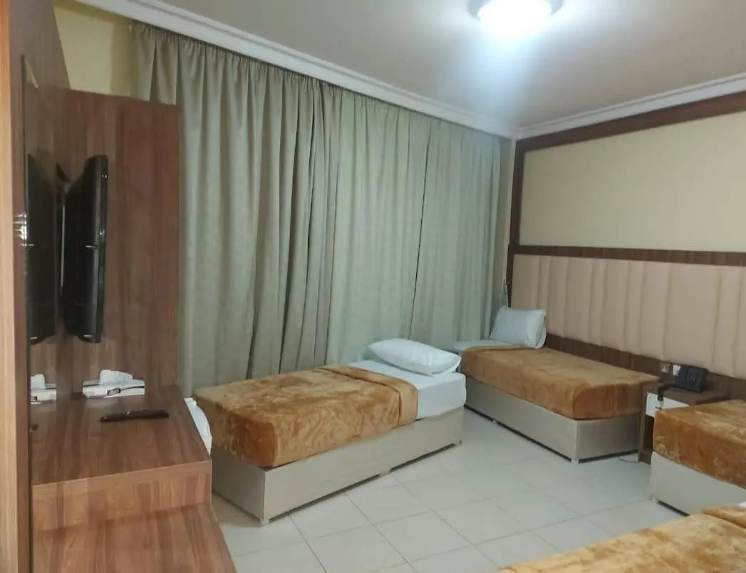 Bed in Diyafa Al Mukhtara Hotel فندق شركة ضيافة المختارة للخدمات الفندقية
