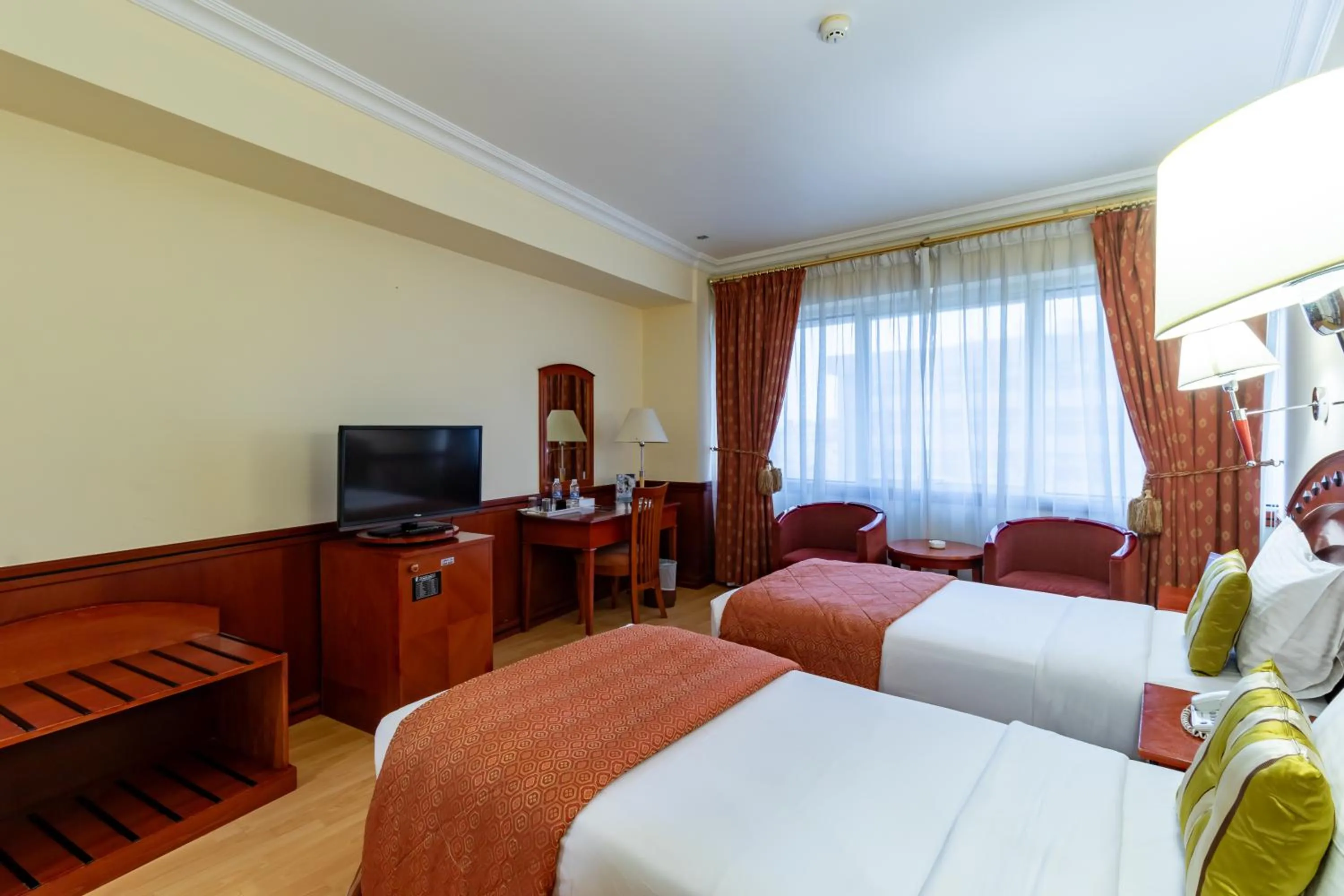 Bed in City Palace Hotel