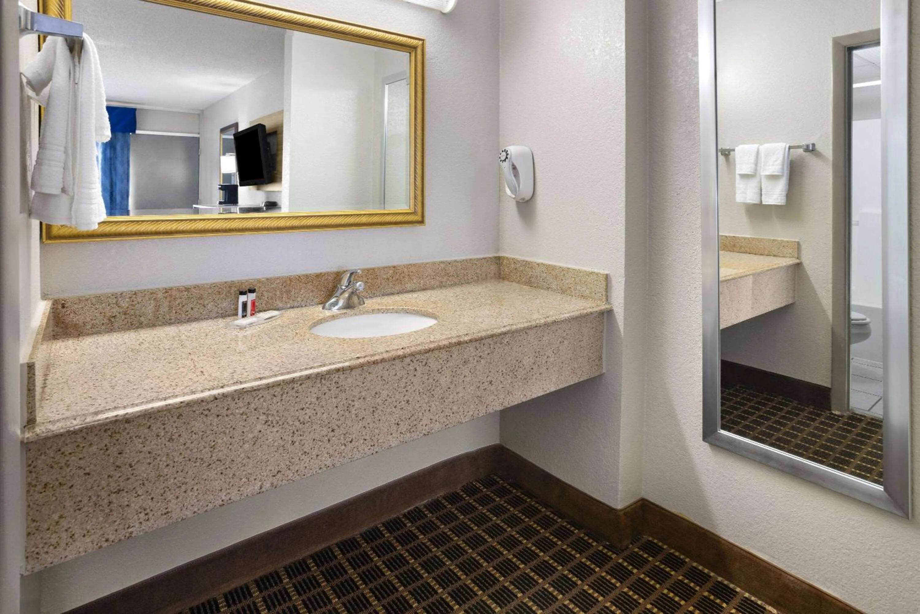 Bathroom in Days Inn by Wyndham Waycross