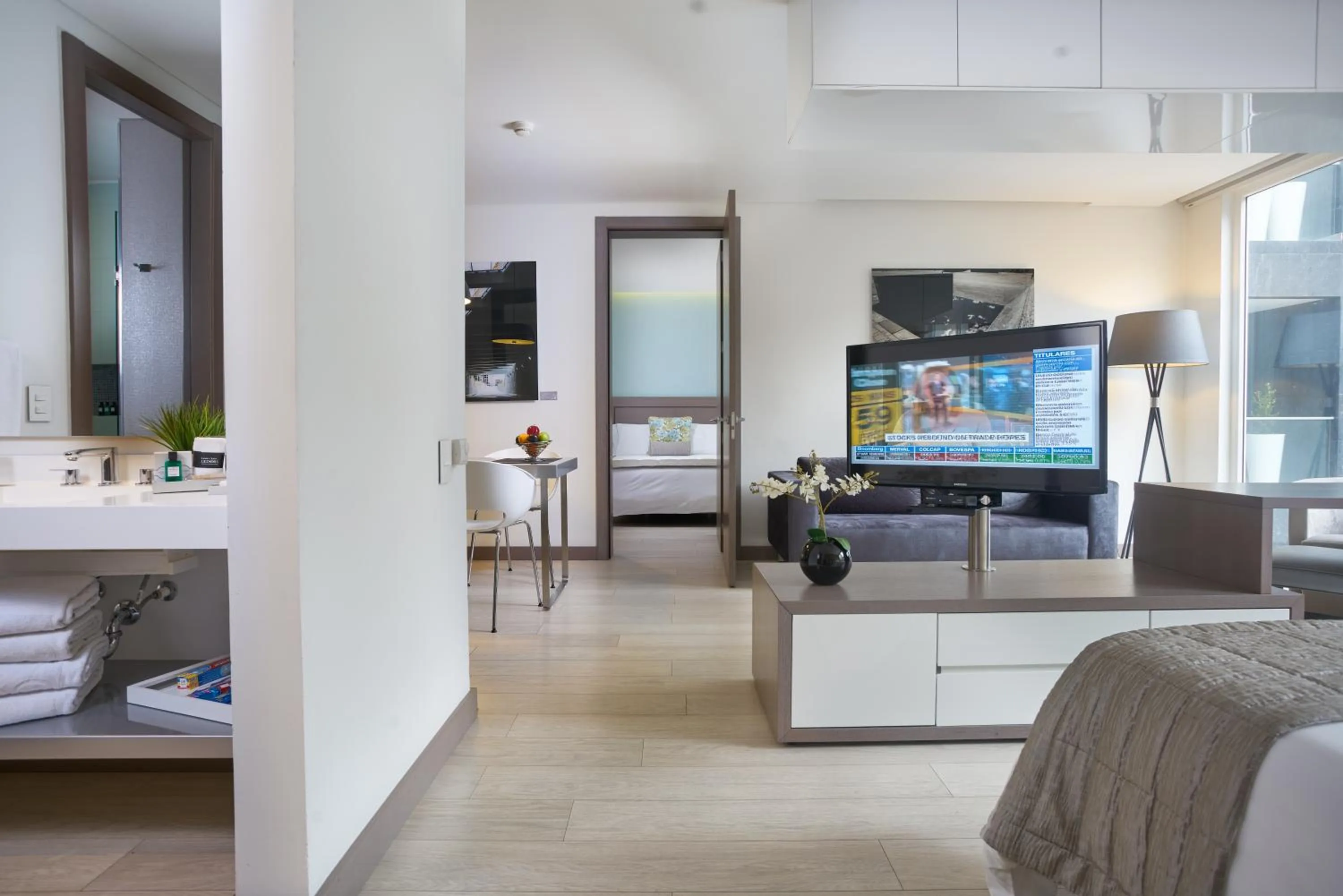 Bed in Hotel 100 Luxury Suites by Preferred