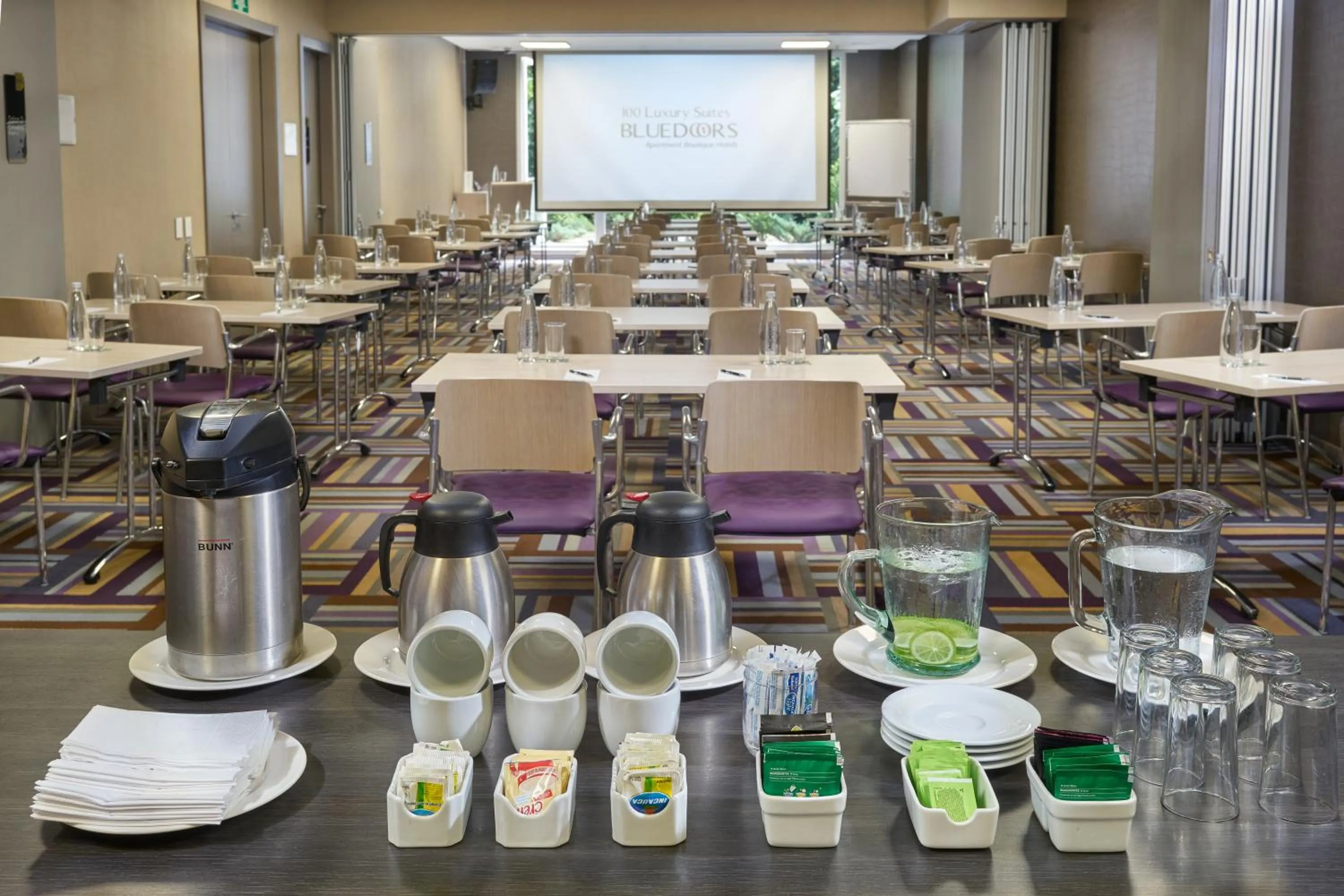 Meeting/conference room in Hotel 100 Luxury Suites by Preferred