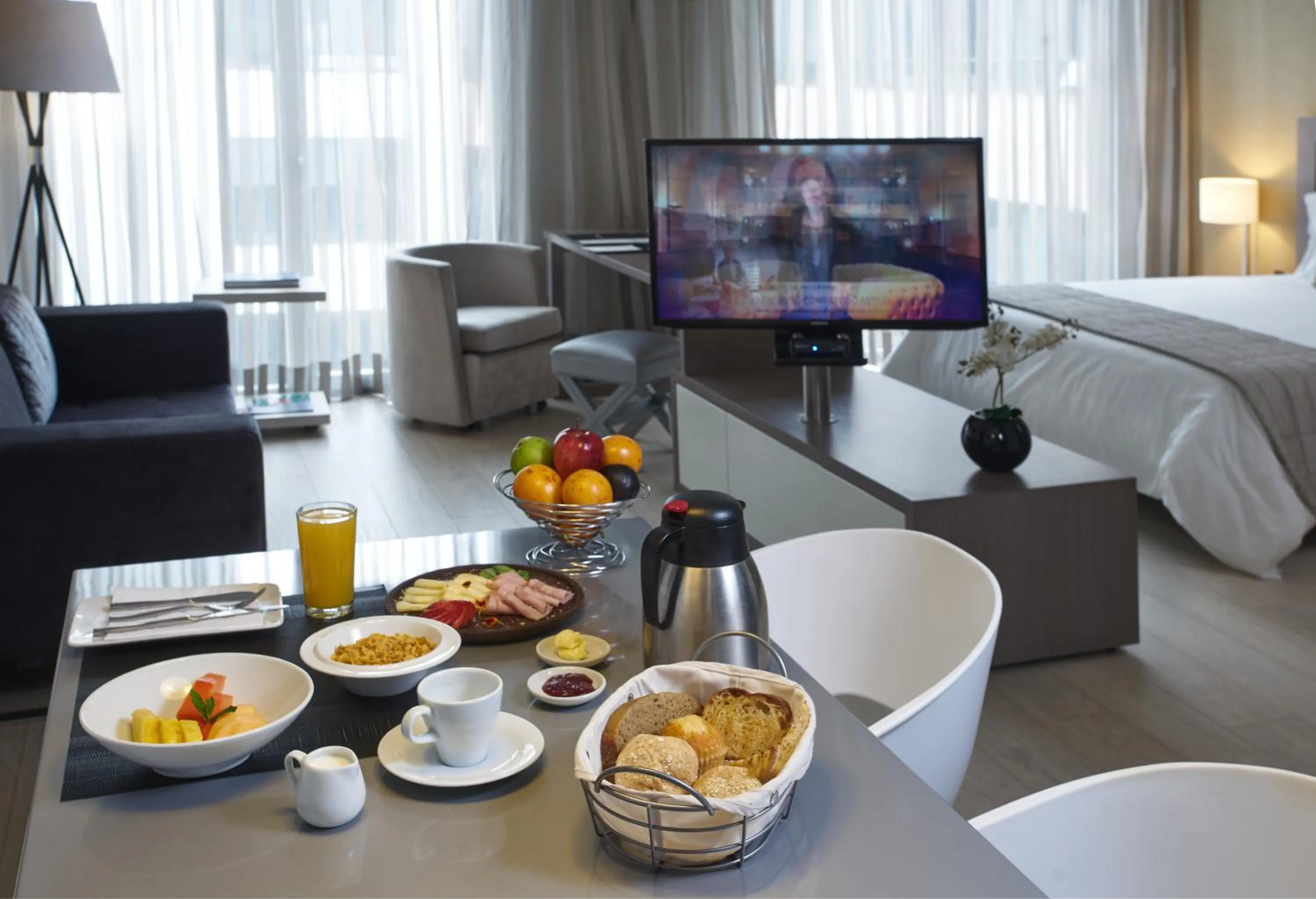 Bed in Hotel 100 Luxury Suites by Preferred