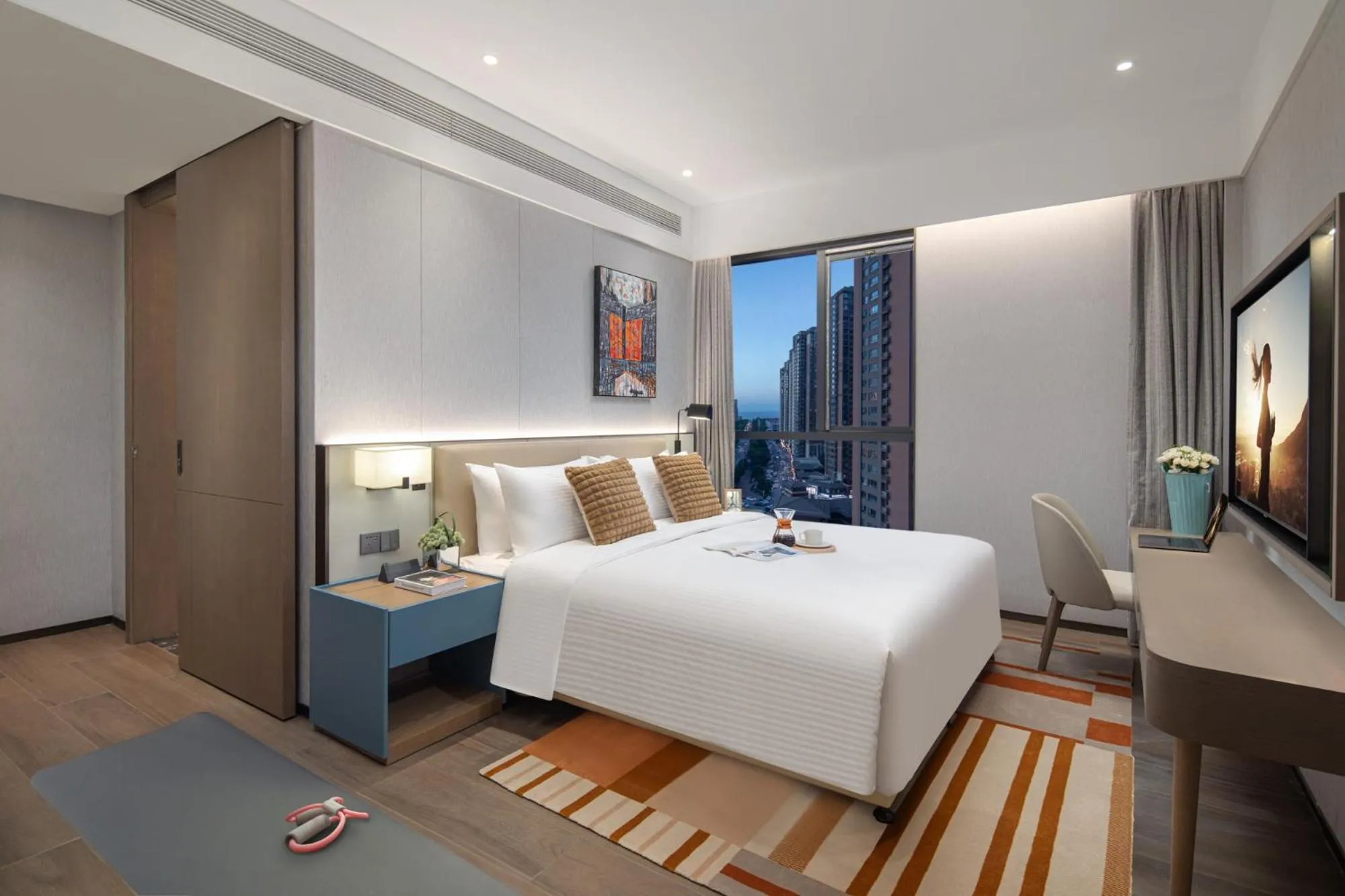TV and multimedia, Bed in Citadines Jinqiao Building Yantai