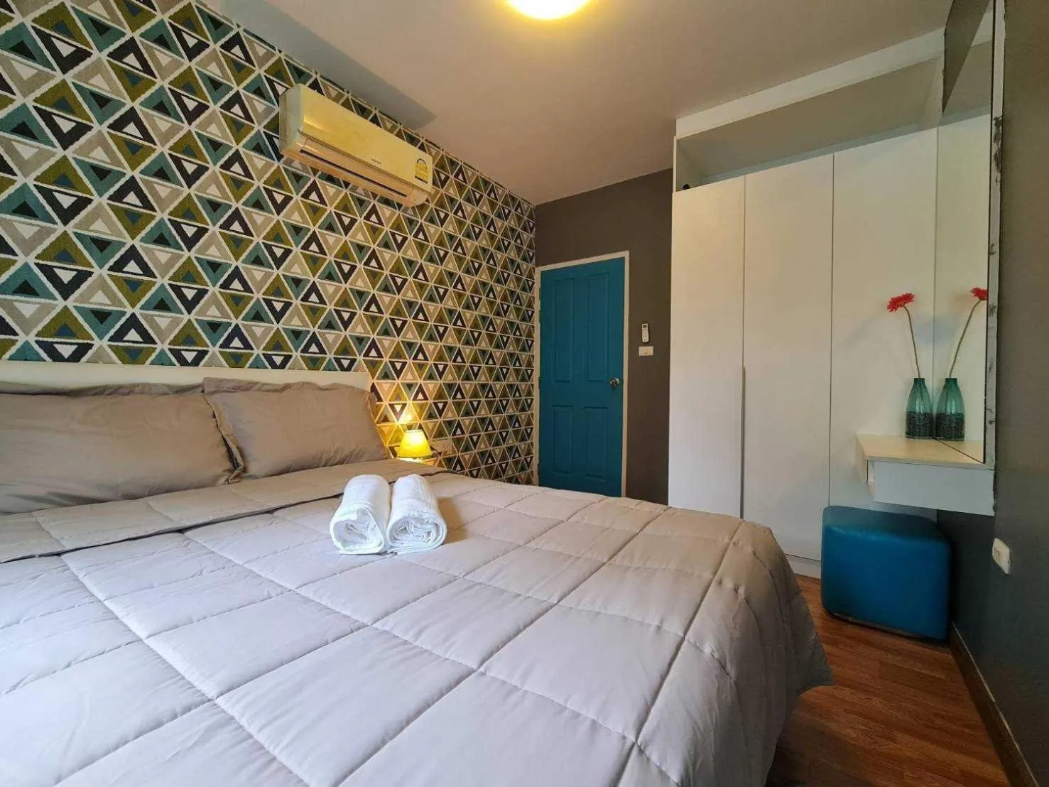 Bed in The Trust Condo by the Sea