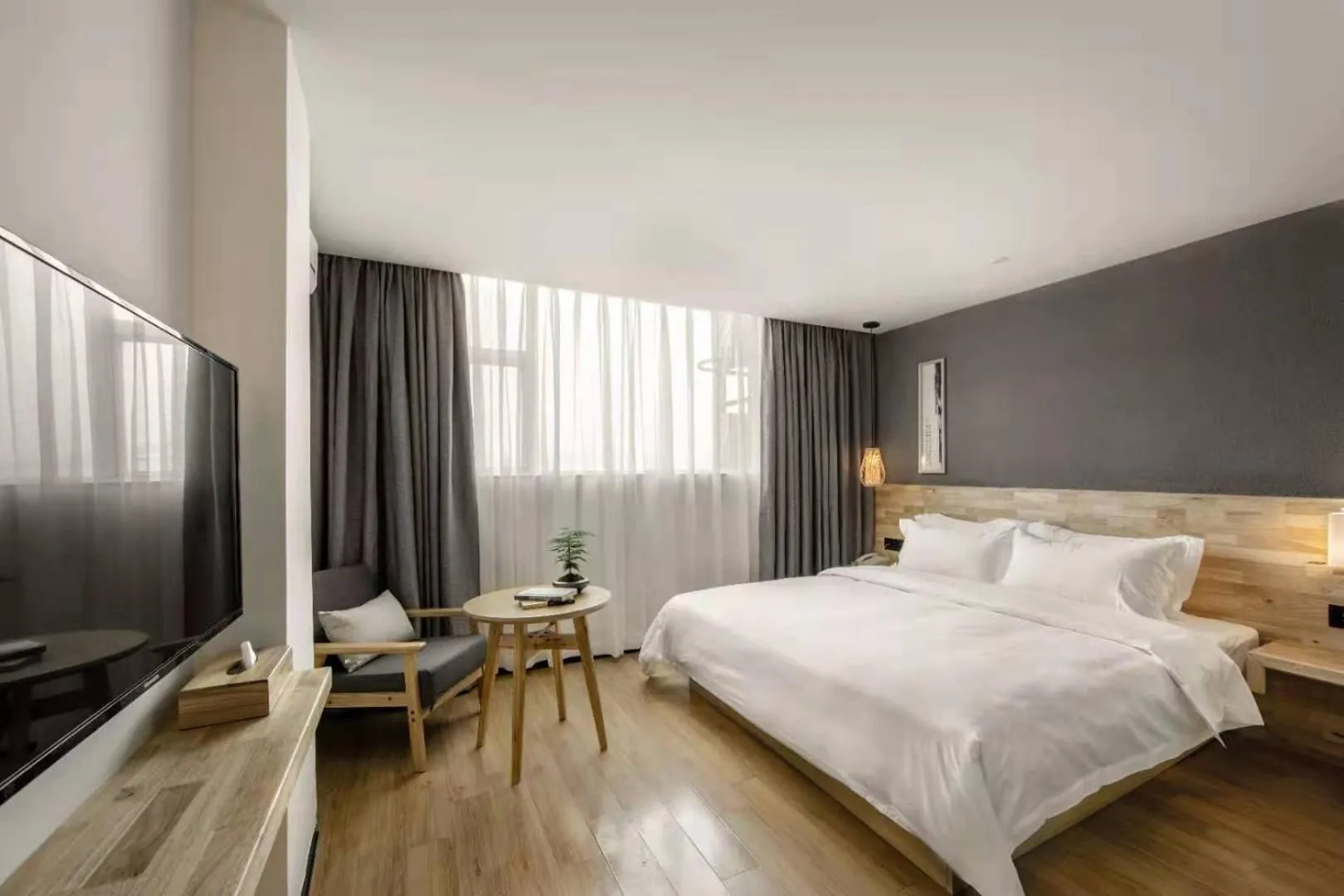 Bed in Guangzhou Shug Art Hotel