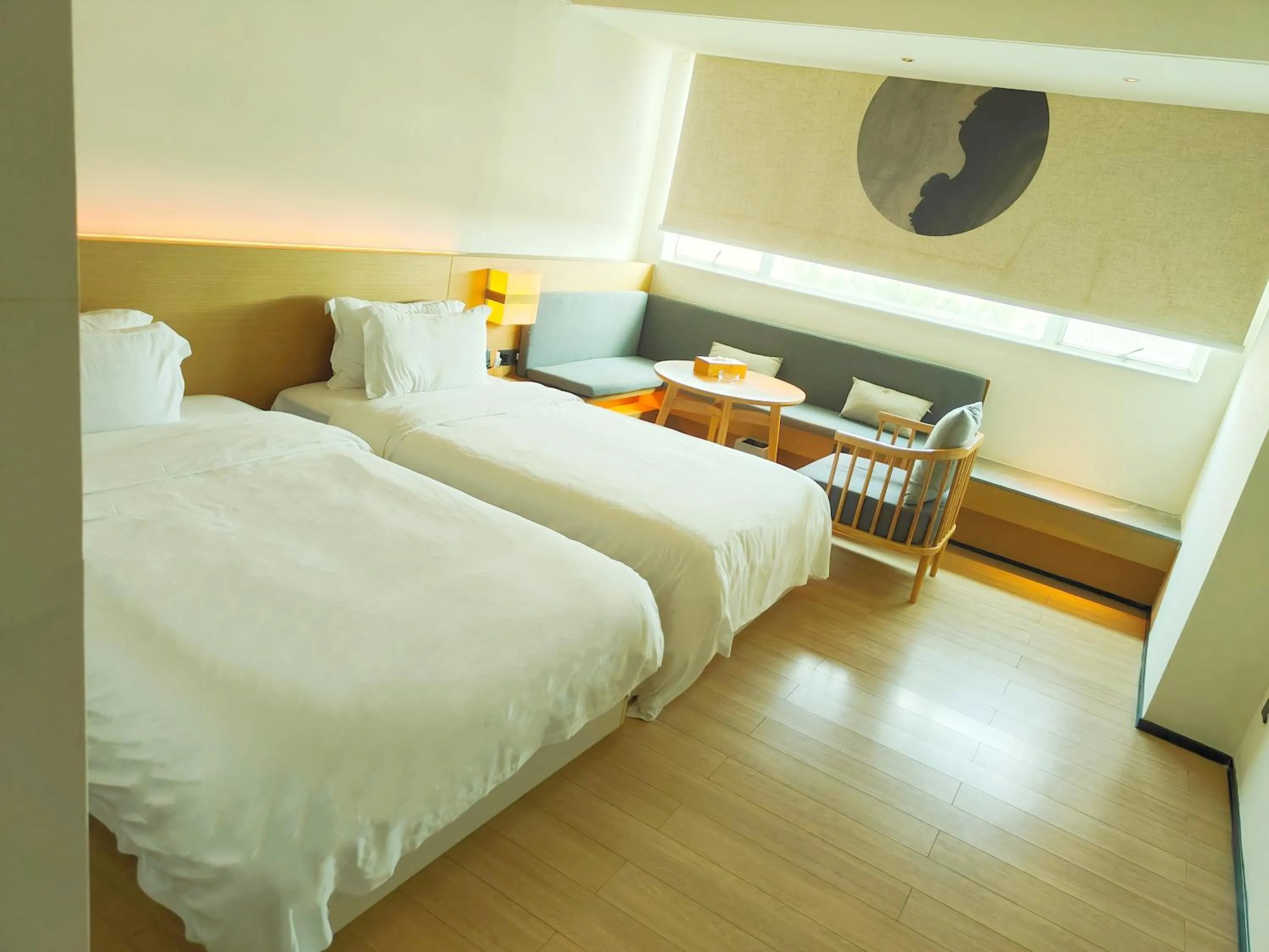 Bed in Guangzhou Shug Art Hotel